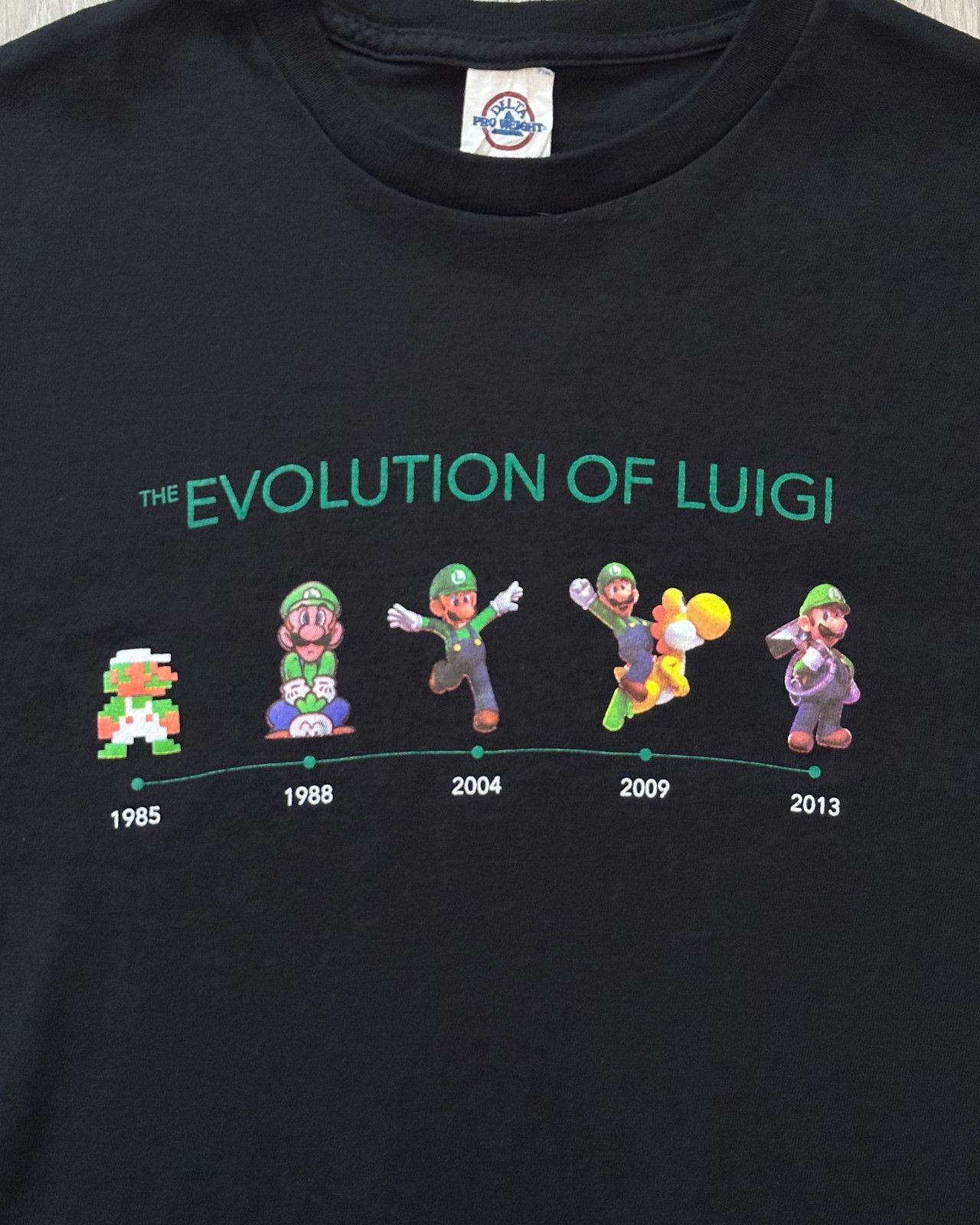 Nintendo Nintendo Evolution of Luigi Black Delta T-Shirt Size Medium Size US M / EU 48-50 / 2 - 3 Thumbnail