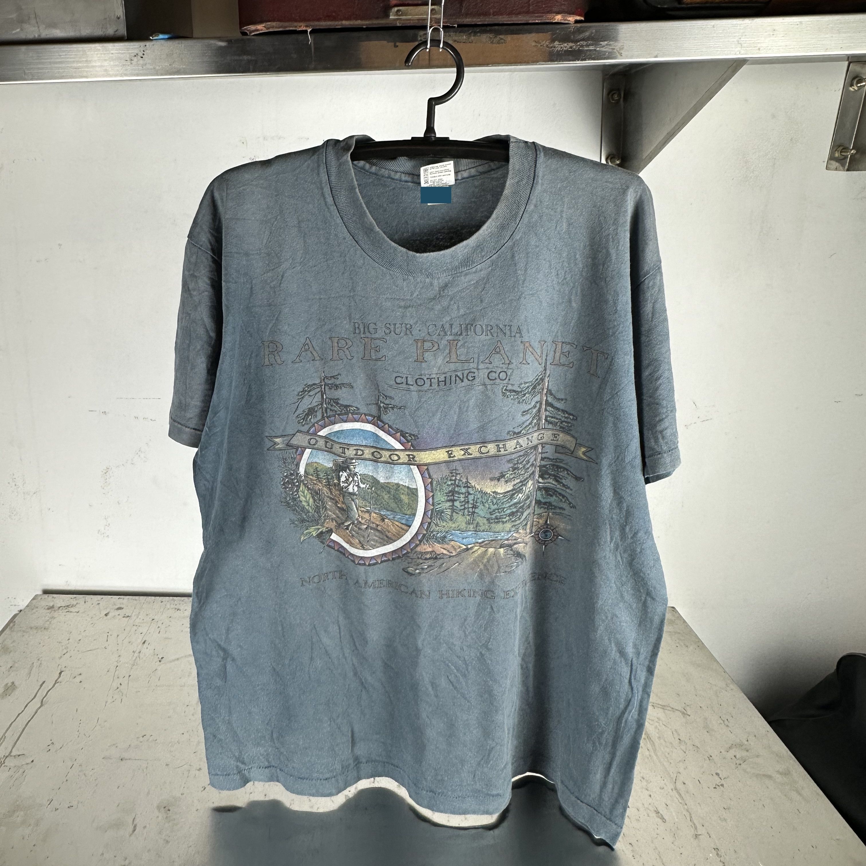 Vintage ​90s Rare Planet Clothing Co. Outdoor Exchange T-shirt Size US XL / EU 56 / 4 - 1 Thumbnail
