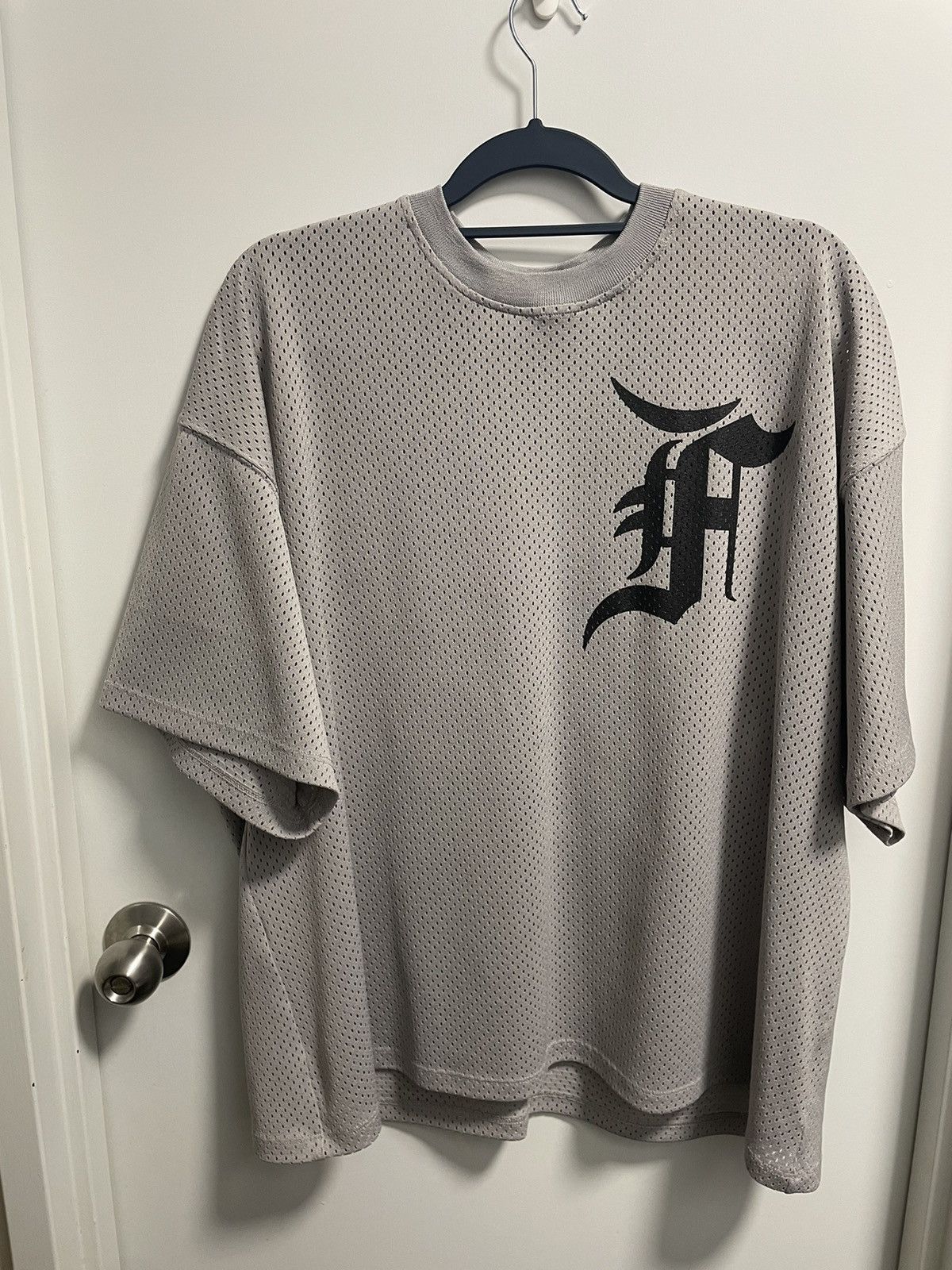 Fear of God Fear of god x union 5th mesh tee jersey s | Grailed