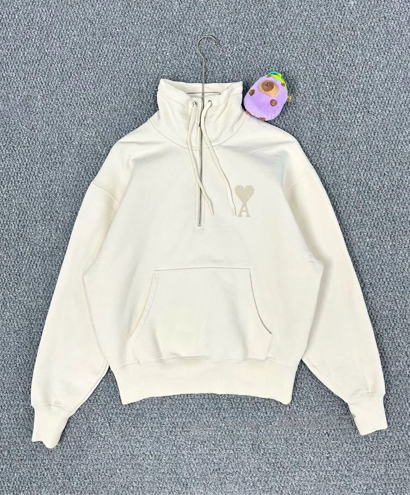AMI Paris Heart Embroidery Half-Zip Sweatshirt.
