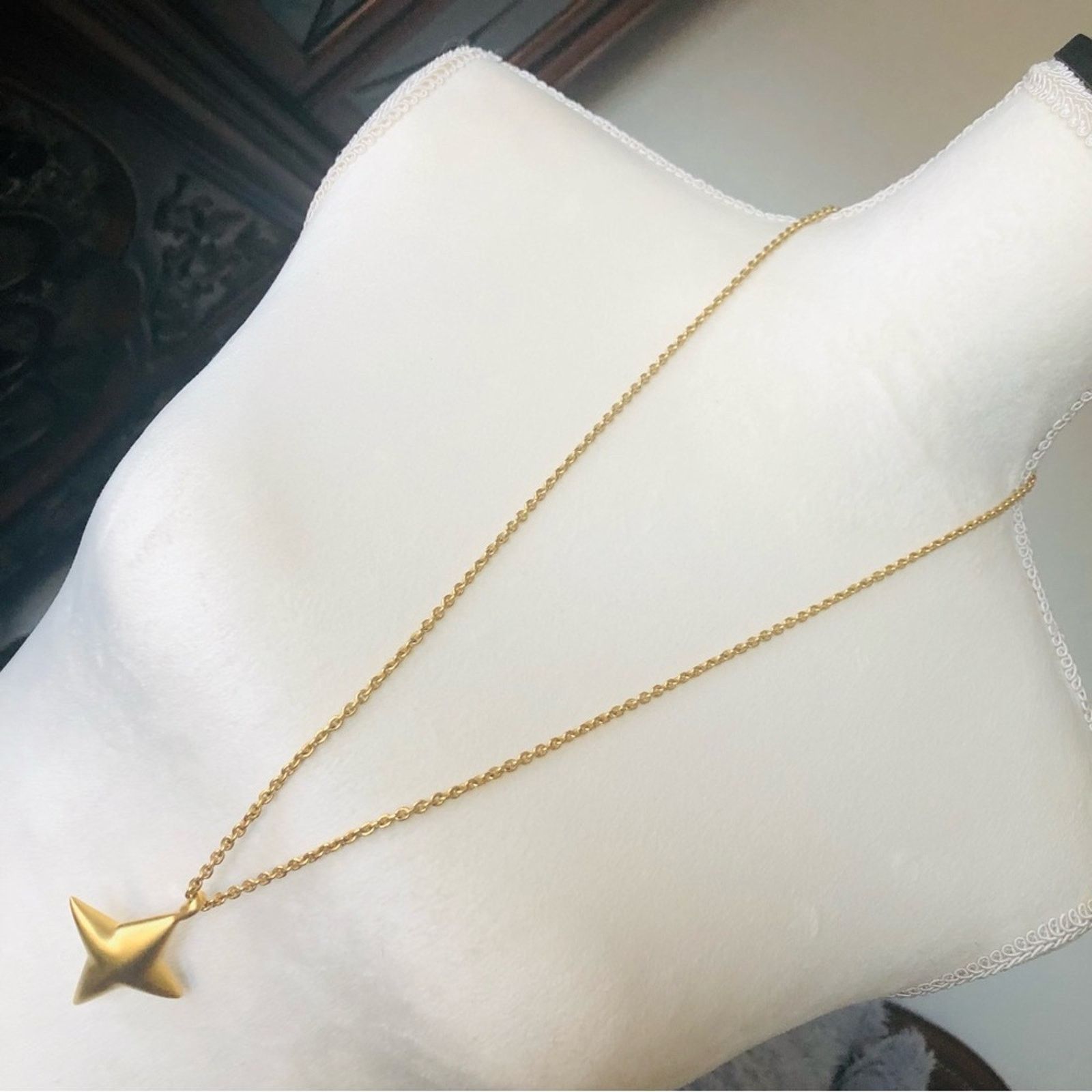 Jewelry Liz Claiborne matte gold 4 point star pendant necklace Size ONE SIZE - 1 Thumbnail
