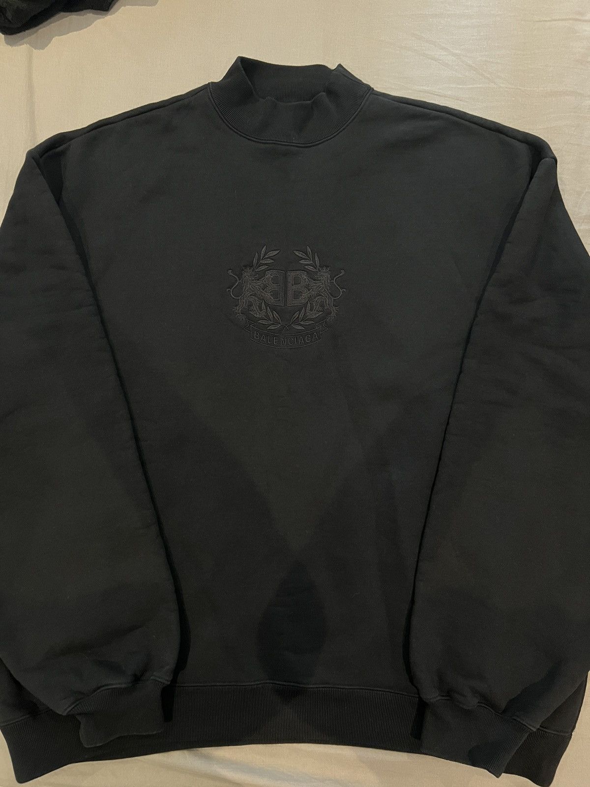 image of Balenciaga Embroidered Crest Logo Sweatshirt in Black, Men's (Size XL)