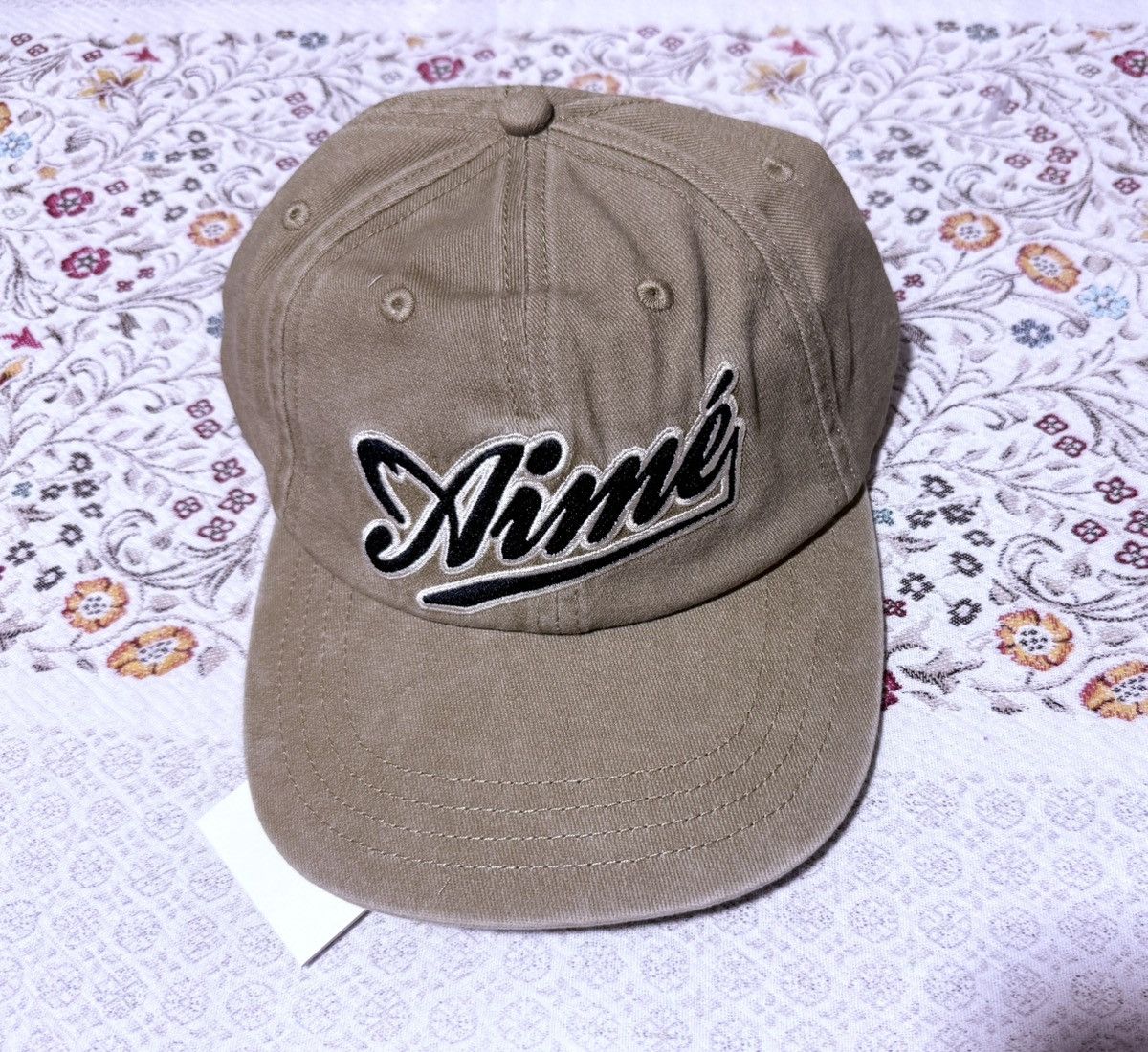 Aime Leon Dore Aime Leon Dore Cycling Logo Hat in “Safari” Cap Tan/Navy Size ONE SIZE - 1 Thumbnail