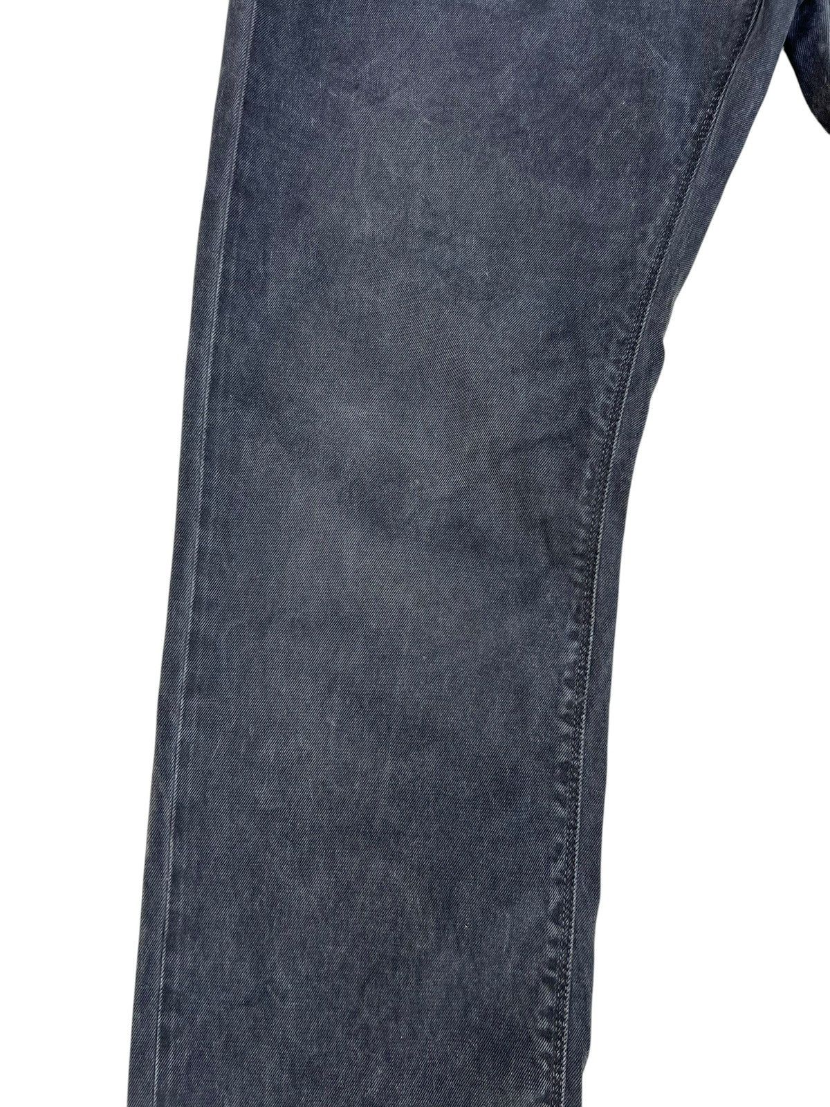 Distressed Prada Waxed Jeans