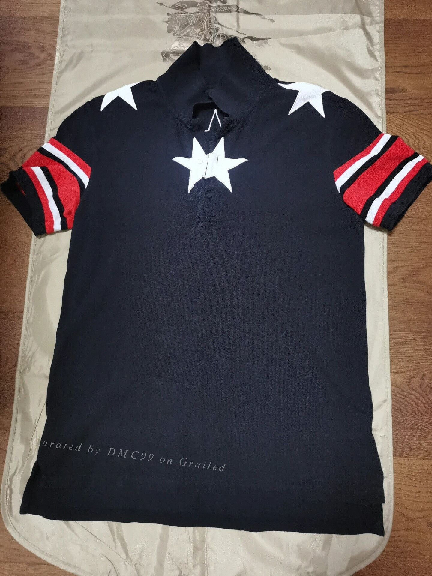 Givenchy Givenchy Stars SS15 Classic Black Polo Shirt | Grailed