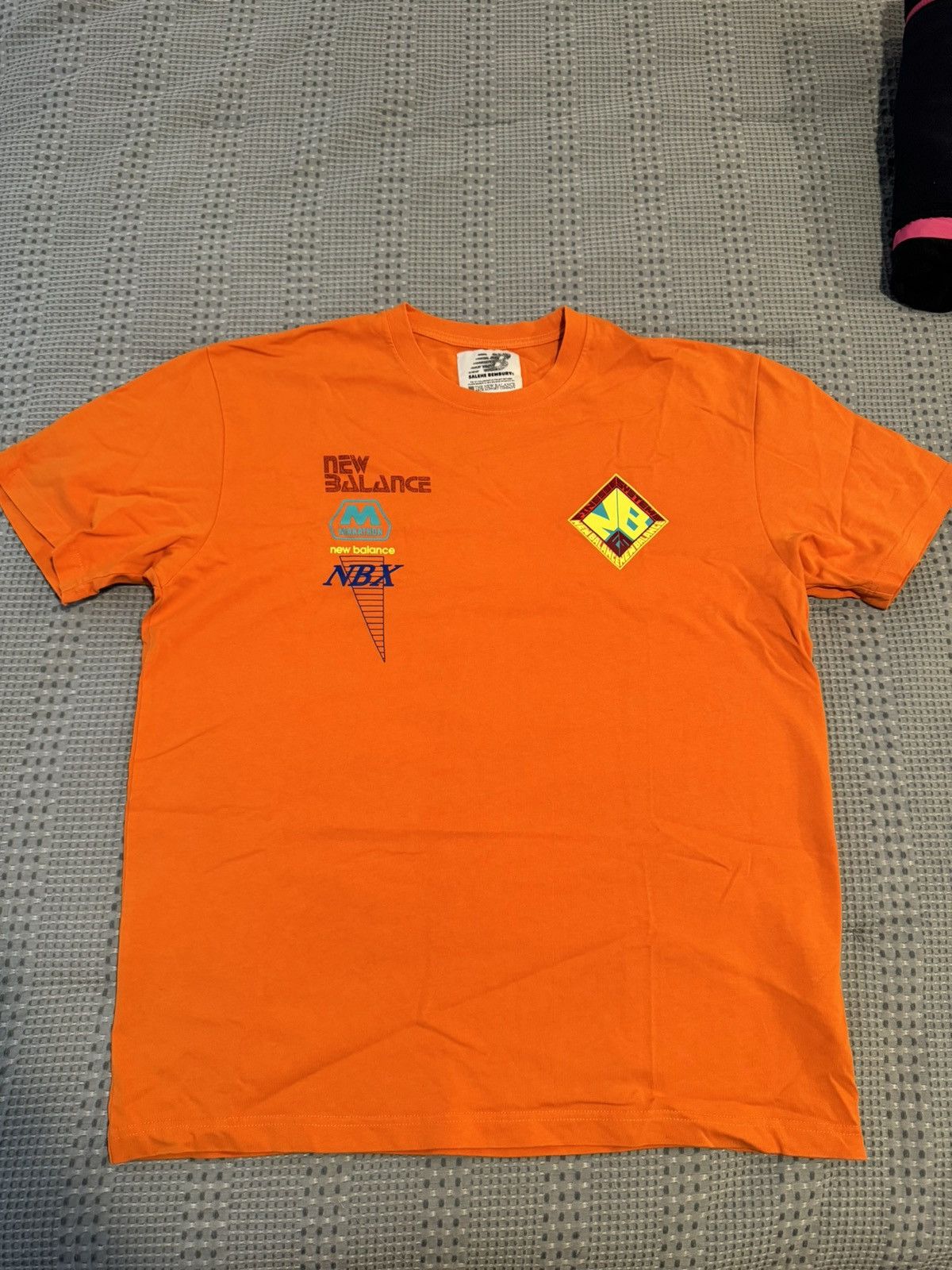 image of New Balance x he Bembury Logo Mania Tee in Orange, Men's (Size Large)