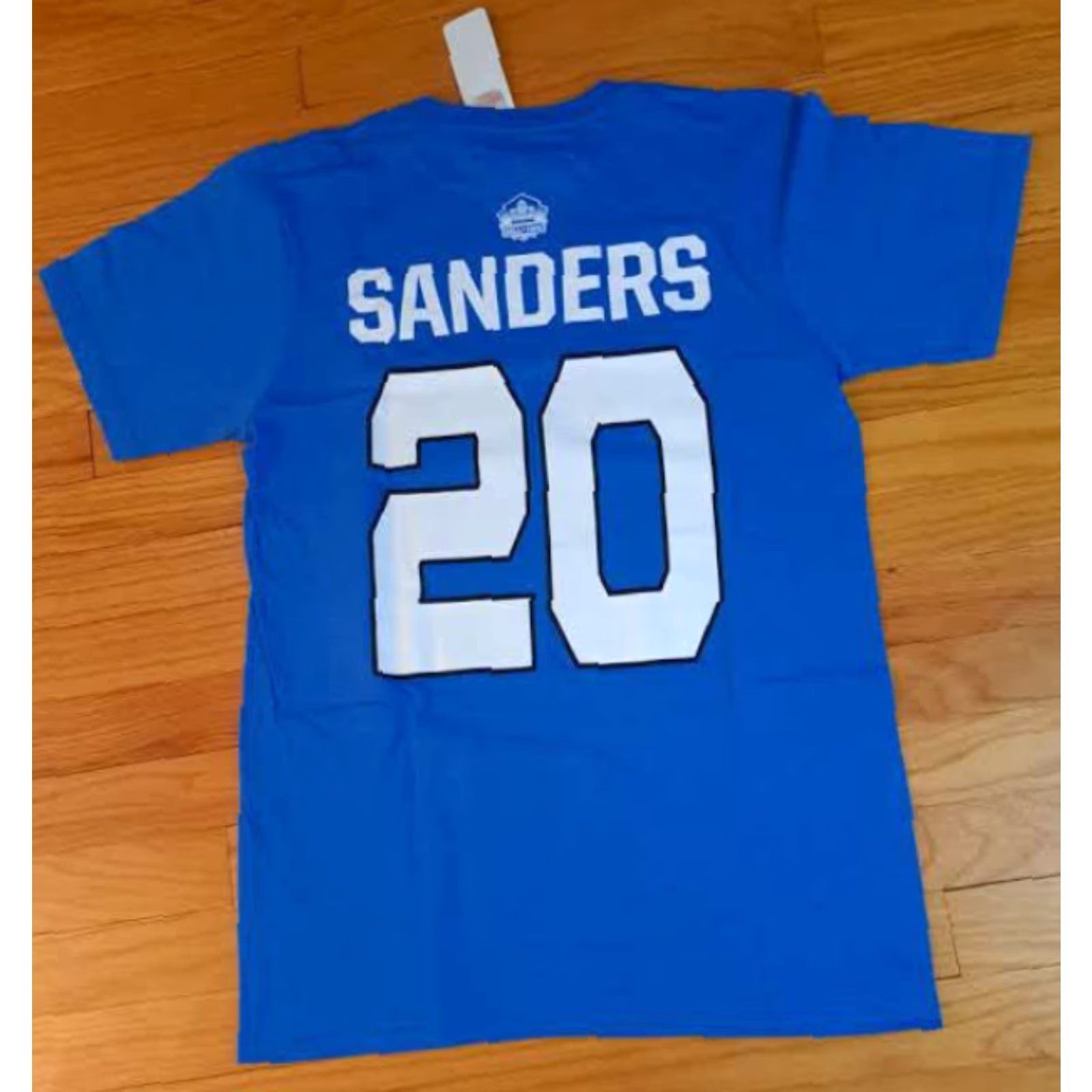 NFL VINTAGE Detroit Lions Barry Sanders Hall of Fame Medium NWT Printed T-Shirt NFL Unisex Adults M Blue Short Sleeve Shirt Mens Size US M / EU 48-50 / 2 - 5 Thumbnail