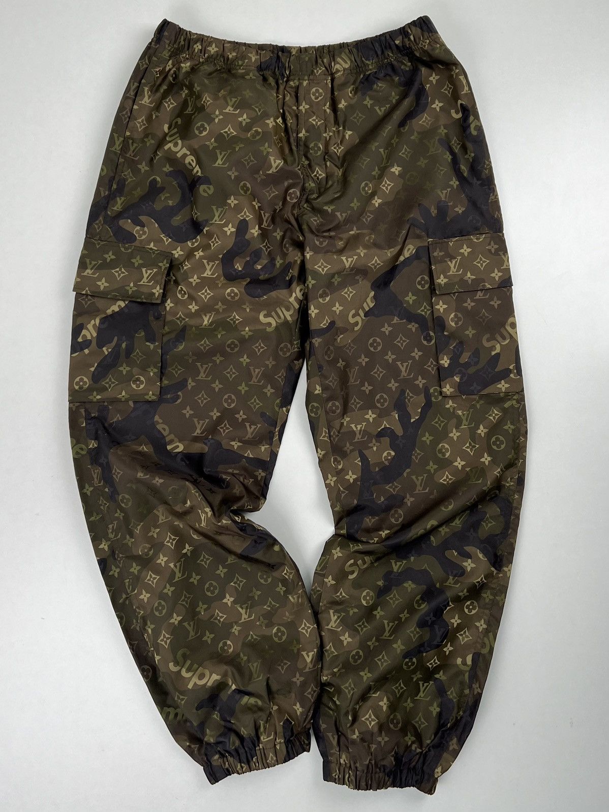 Supreme LV supreme Camo monogram nylon track pants 40 | Grailed