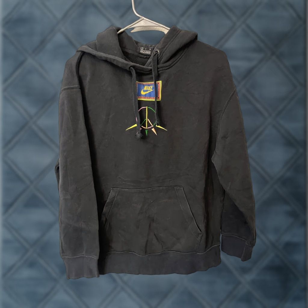 Nike NIKE Womens Sportswear Peace Pack Hoodie Black Small Distresed Pullover Embroidered 90s Peace Logo Activewear Casual Womens Hoodie, Black, Size S Size S / US 4 / IT 40 - 1 Thumbnail