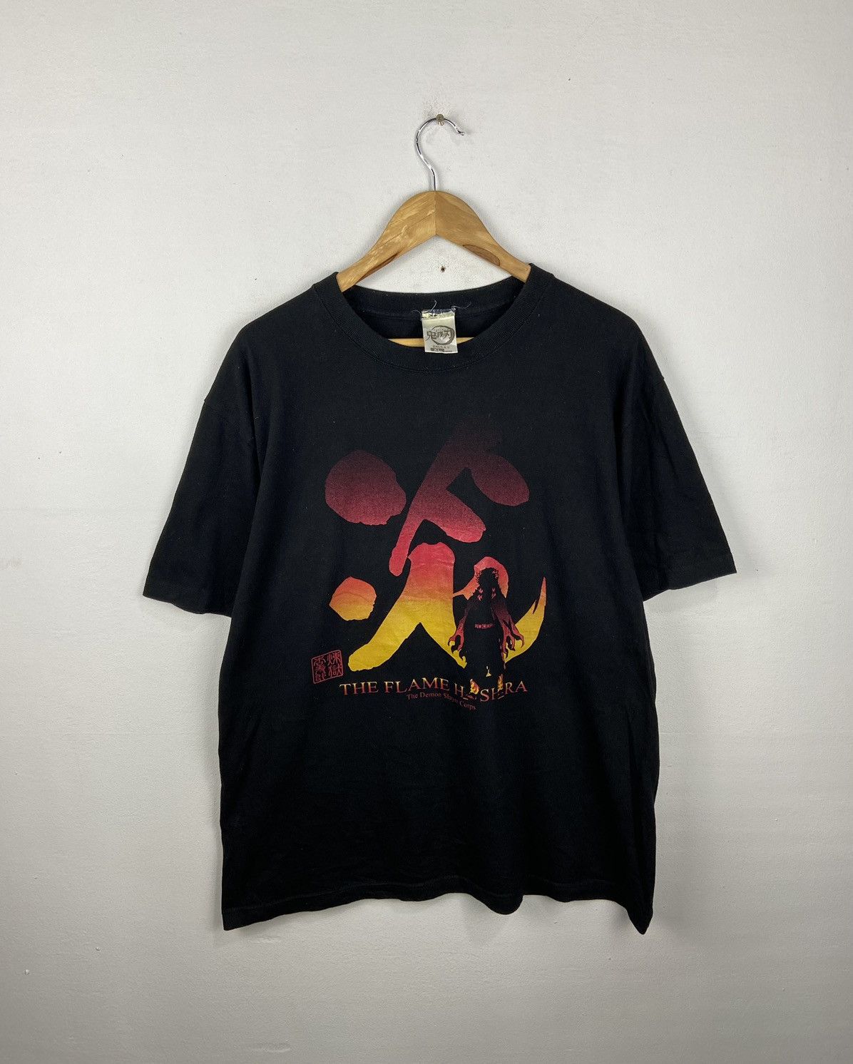 image of Cartoon Network x Demon Slayer Kyojuro Rengoku Flame Hashira Tee in Black, Men's (Size Large)