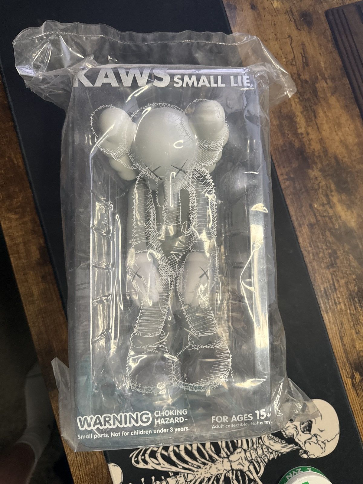 image of Kaws Small Lie Companion Vinyl Figure in Grey, Men's