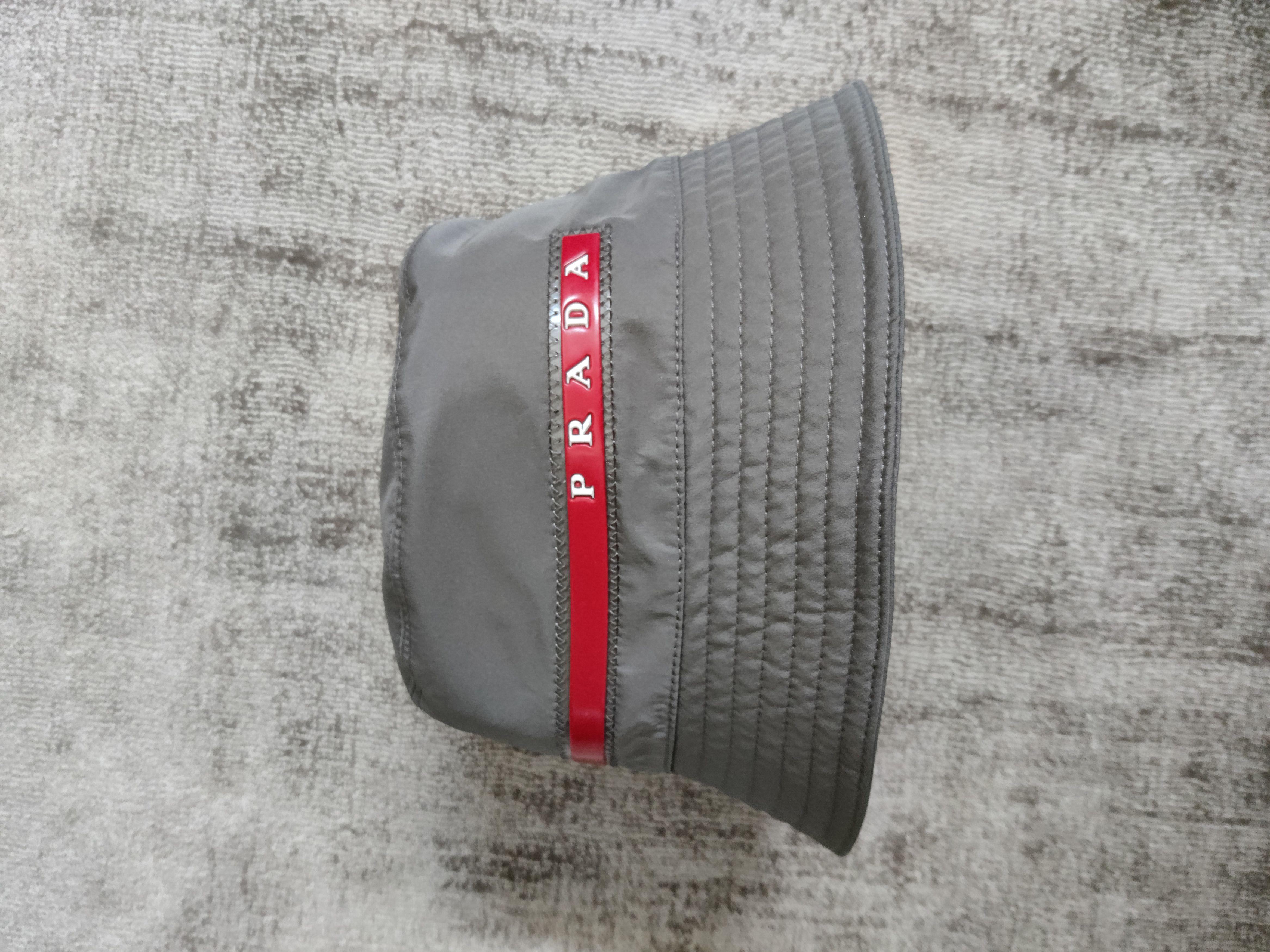 image of Prada Linea Rossa Bucket Hat in Grey, Men's