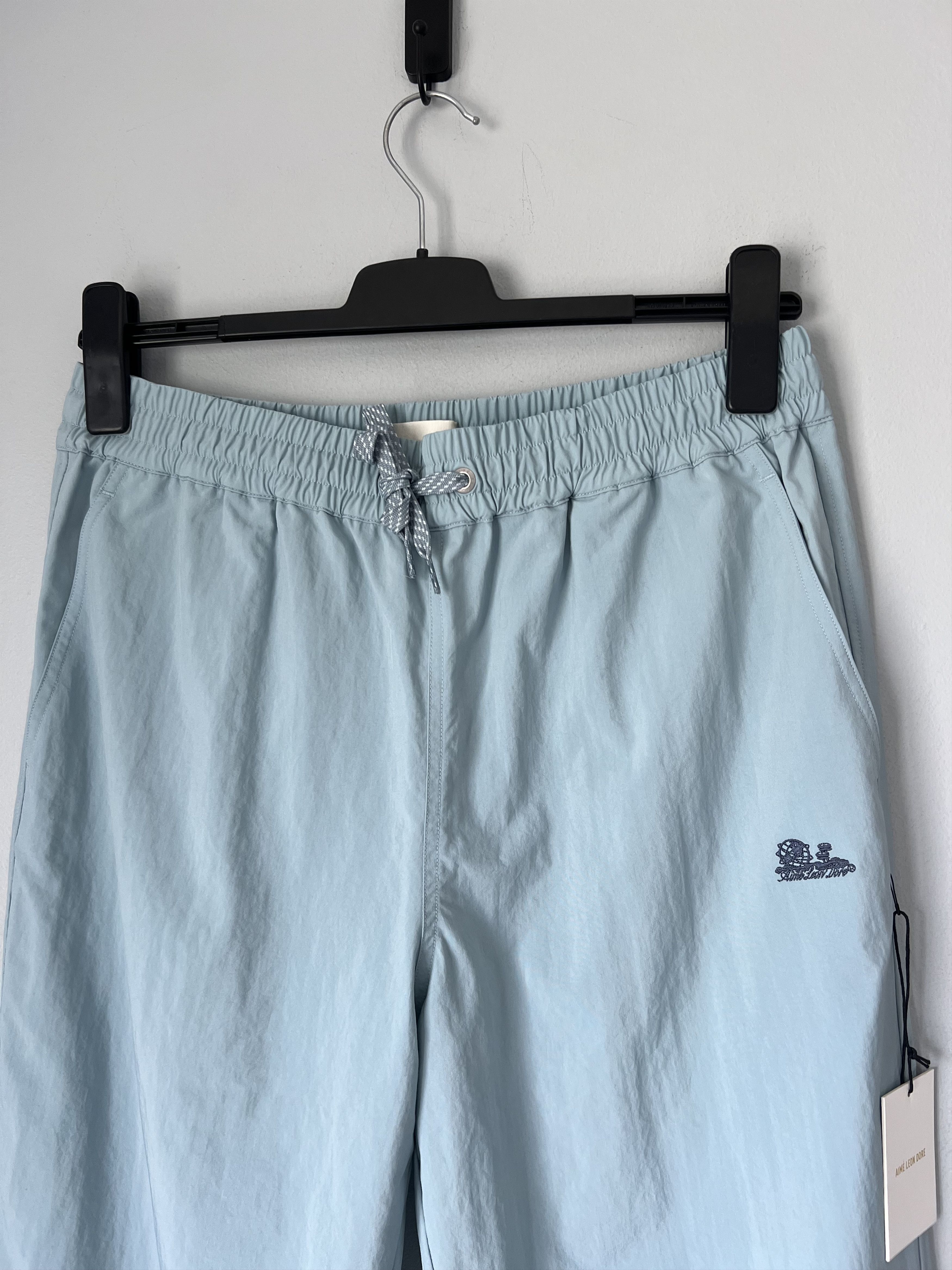 Aime Leon Dore Aime Leon Dore Unisphere Logo Nylon Track Pants Tourmaline Size US 34 / EU 50 - 2 Thumbnail