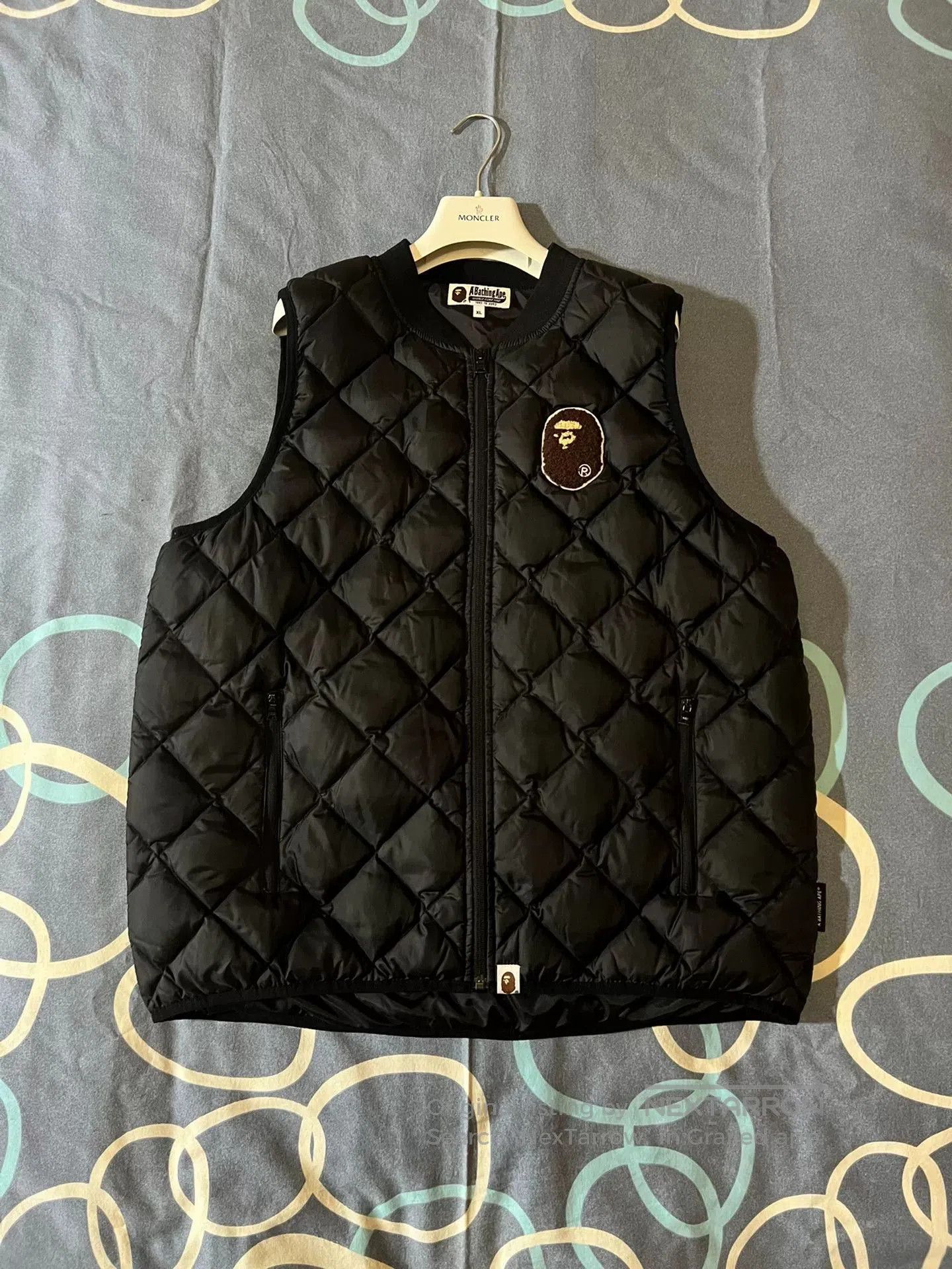 bape black fleece gorilla head down vest.
