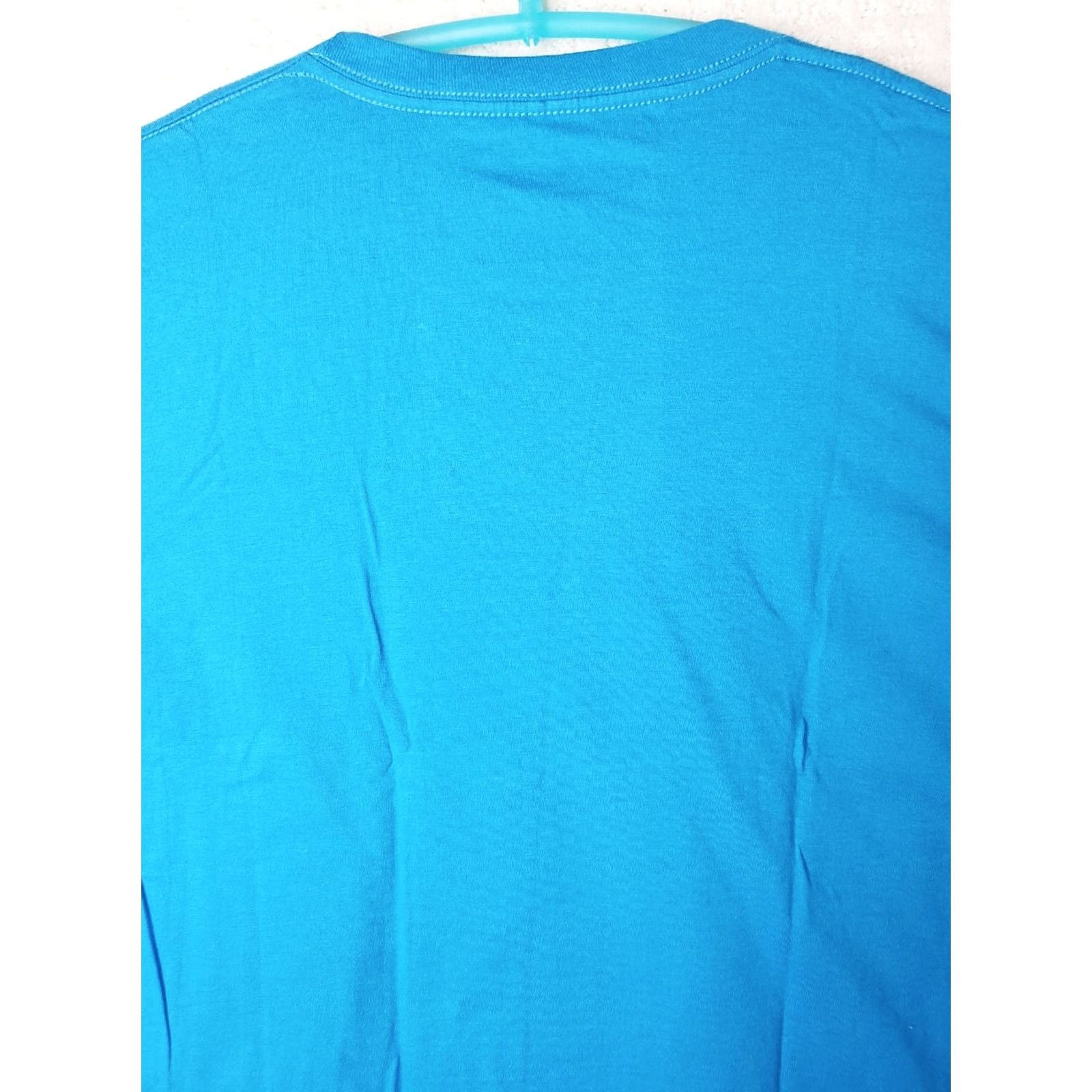 Vintage Tony Hawk T-Shirt Mens XL Blue Short Sleeve Crew Neck California Likes To Party Bear Logo Saying Graphic Print Jersey Solid Size US XL / EU 56 / 4 - 7 Thumbnail