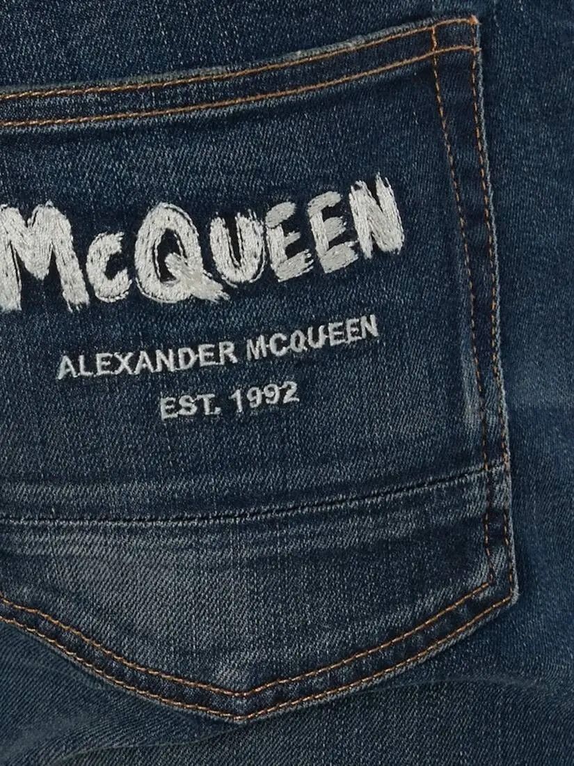 o1w1db10925 Mcqueen Graffiti Denim Jeans in Washed Blue
