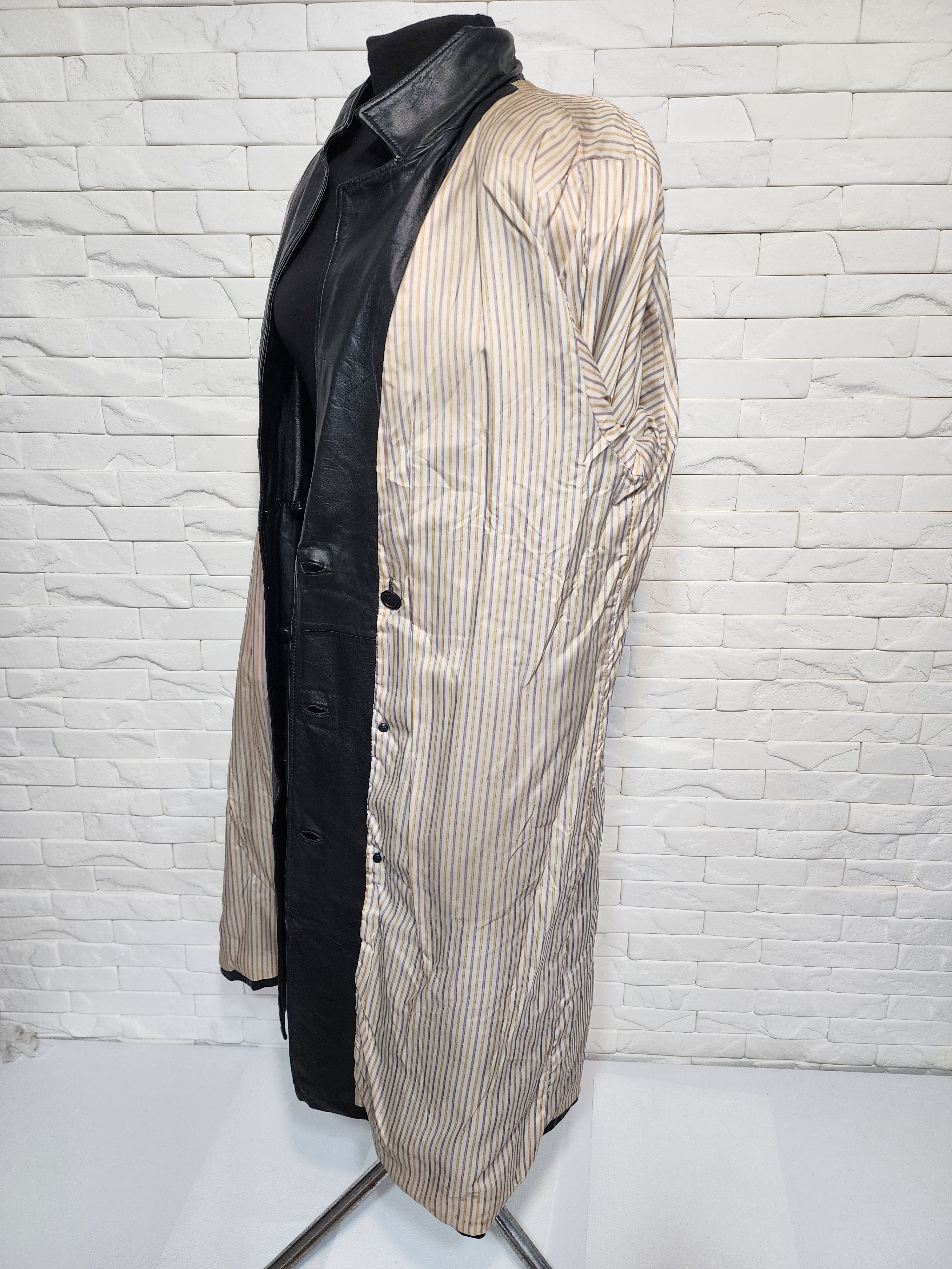 Women black leather raincoat.