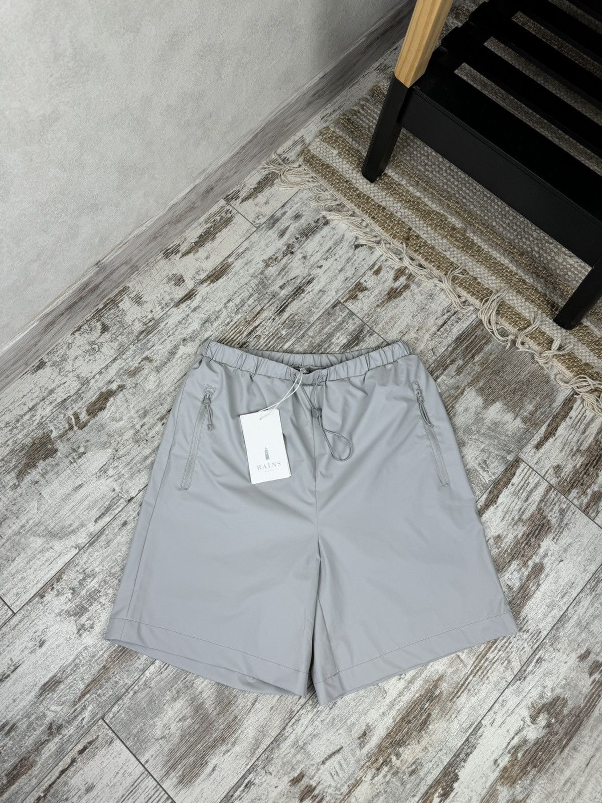 Rains Rains orange shorts Grailed