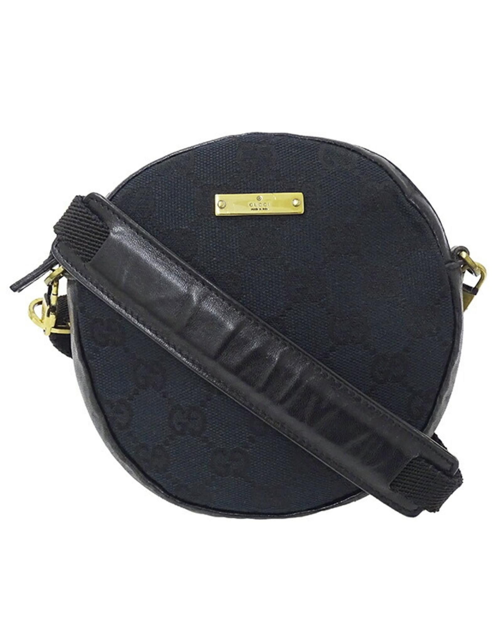 image of Gucci Versatile GG Canvas Pouch And Shoulder Bag in Black, Women's