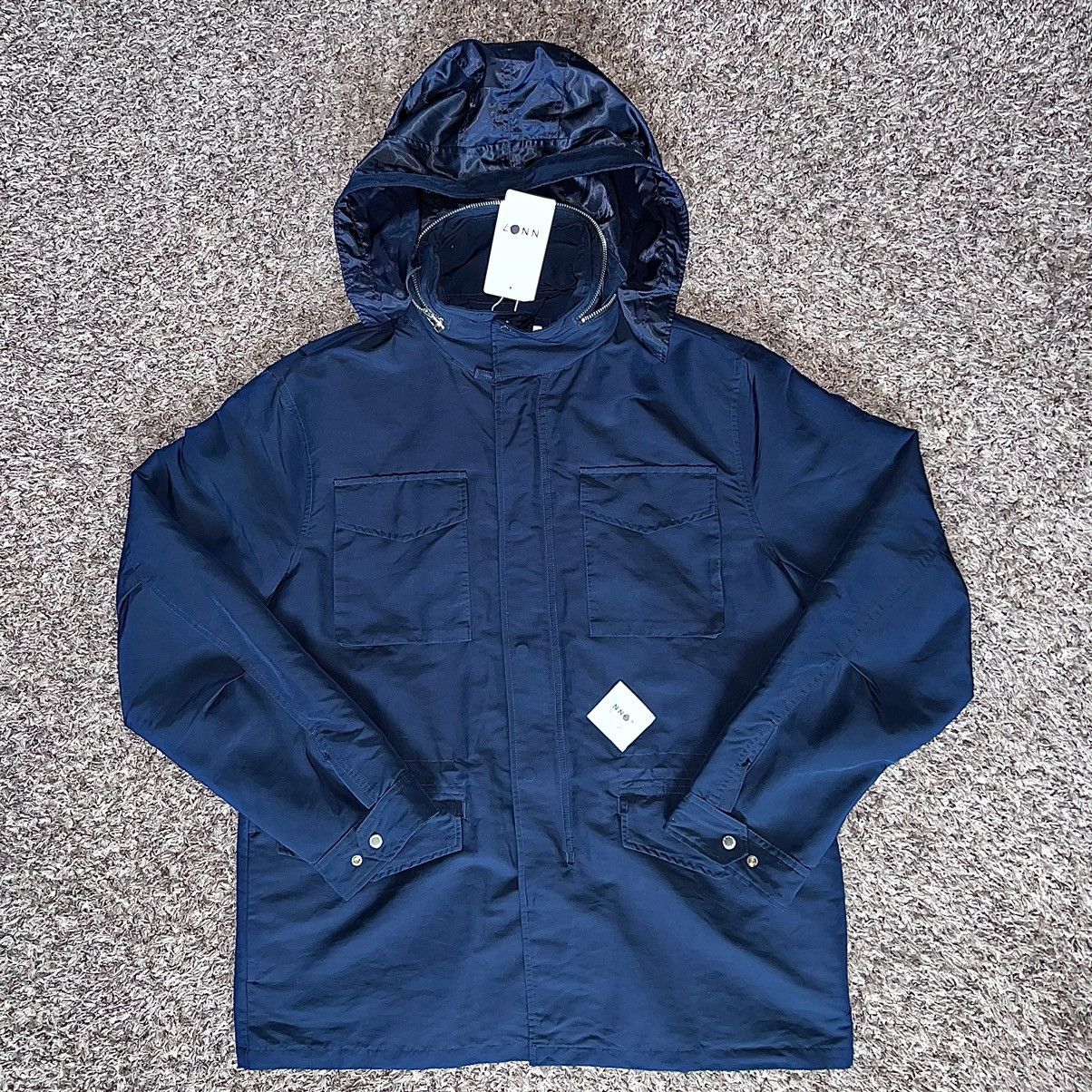 NN07 NN07 blue raincoat jacket no nationality pfc waterproof Size US L / EU 52-54 / 3 - 1 Thumbnail
