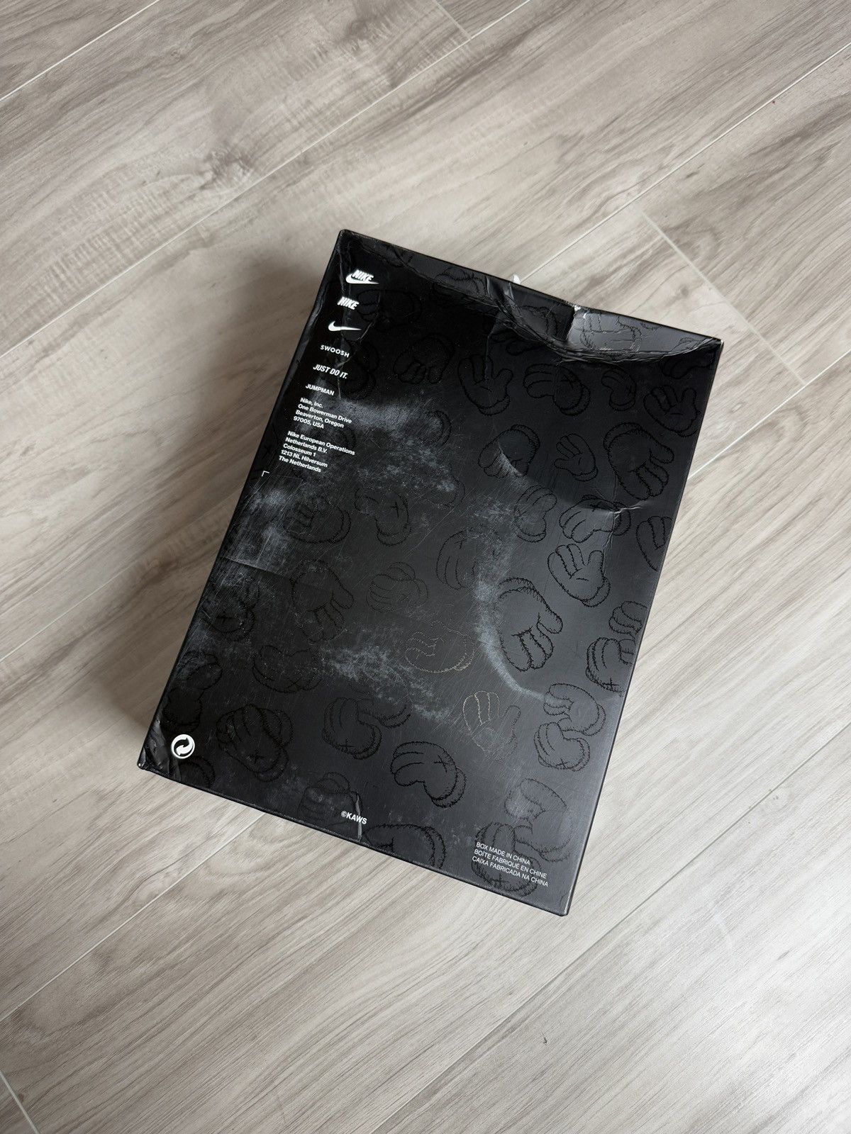 Jordan 4 Grey Kaws