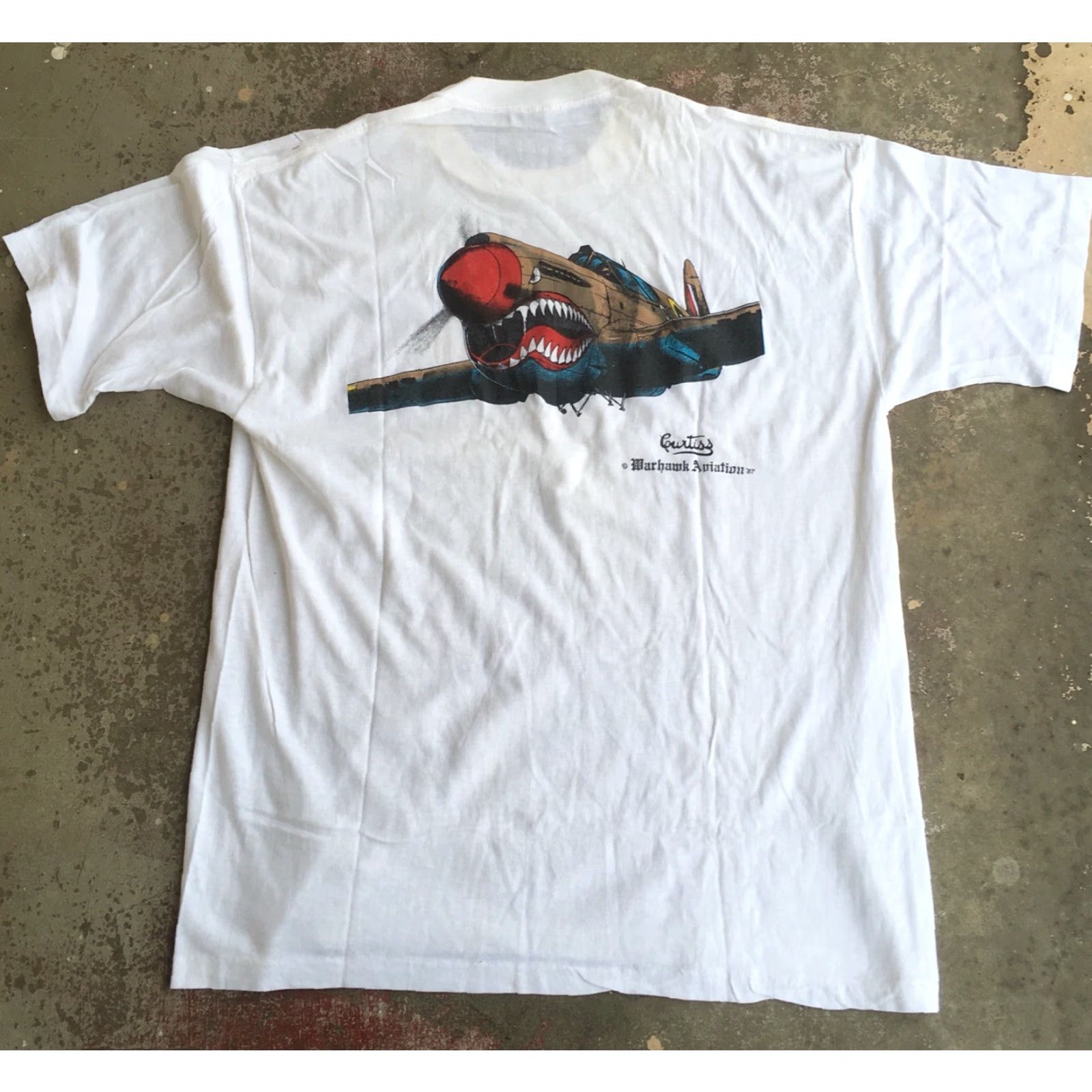 Vintage VINTAGE Belton Curtiss Warhawk Aviation 87 T-Shirt Made In USA XL 46 48 1980s 80s White Mens Short Sleeve Graphic Tee Size US XL / EU 56 / 4 - 5 Thumbnail
