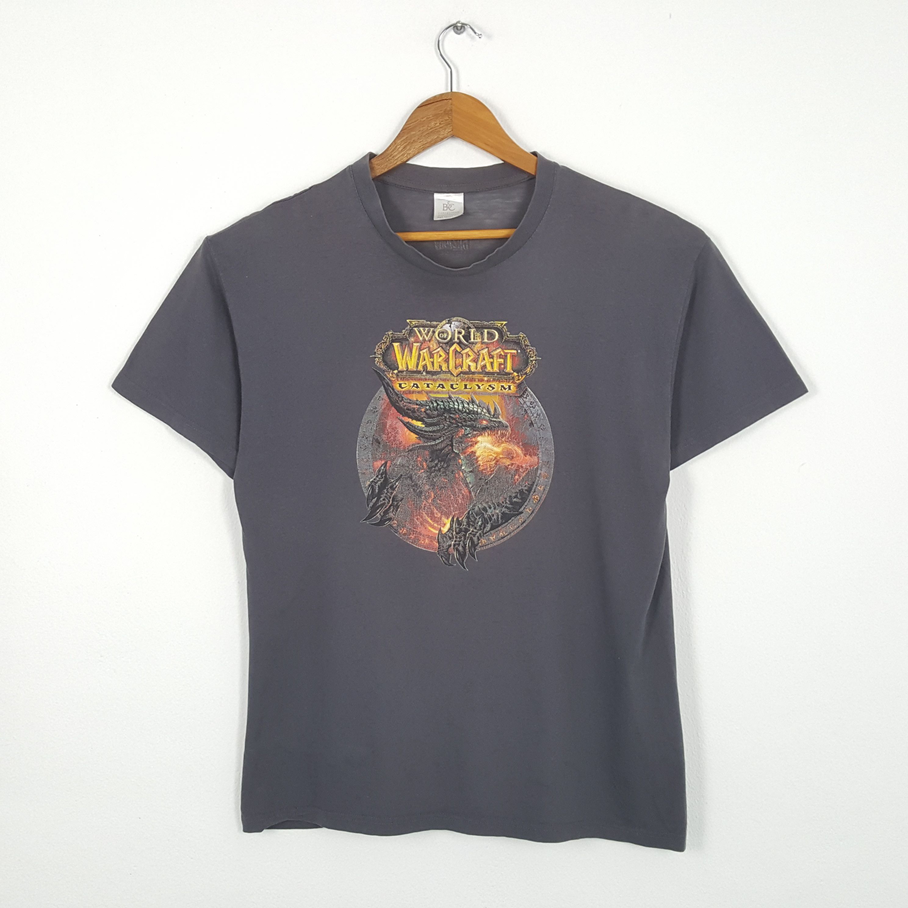 image of Vintage World Of Warcraft Playstation Games T-Shirts in Grey, Men's (Size Medium)