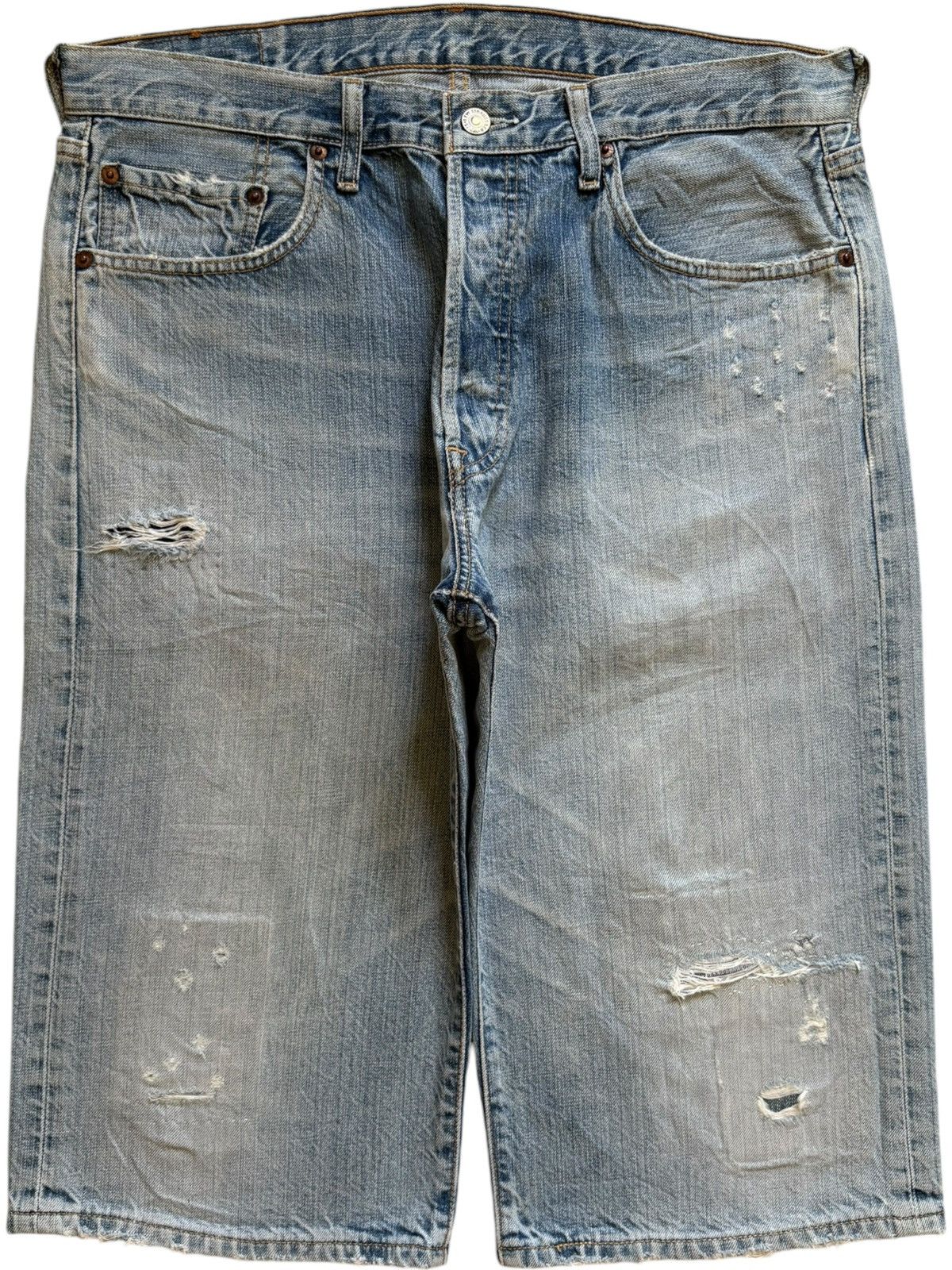 501 light wash distressed denim cutoff shorts levi's best sale