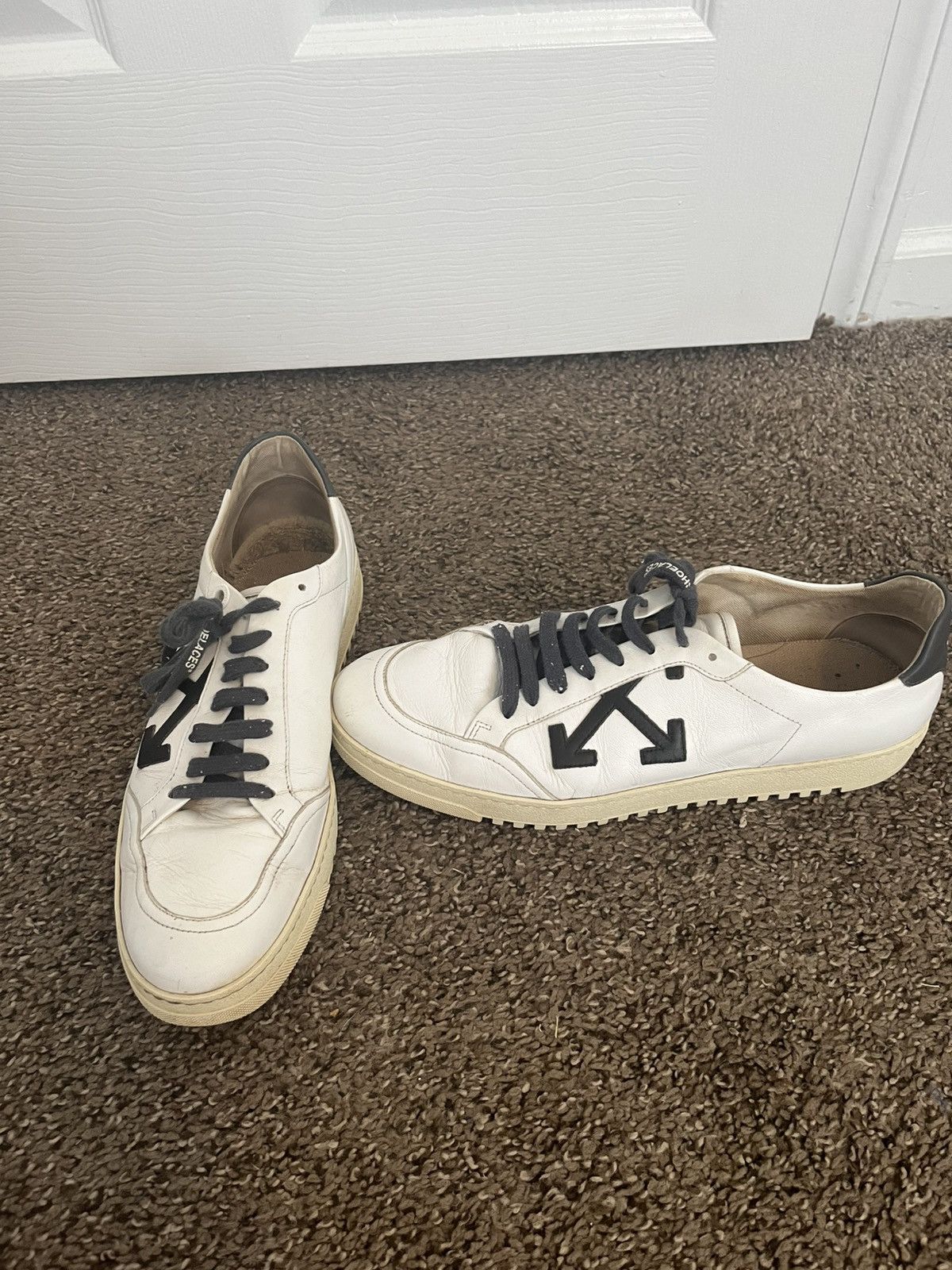 Off-white leather sneakers
