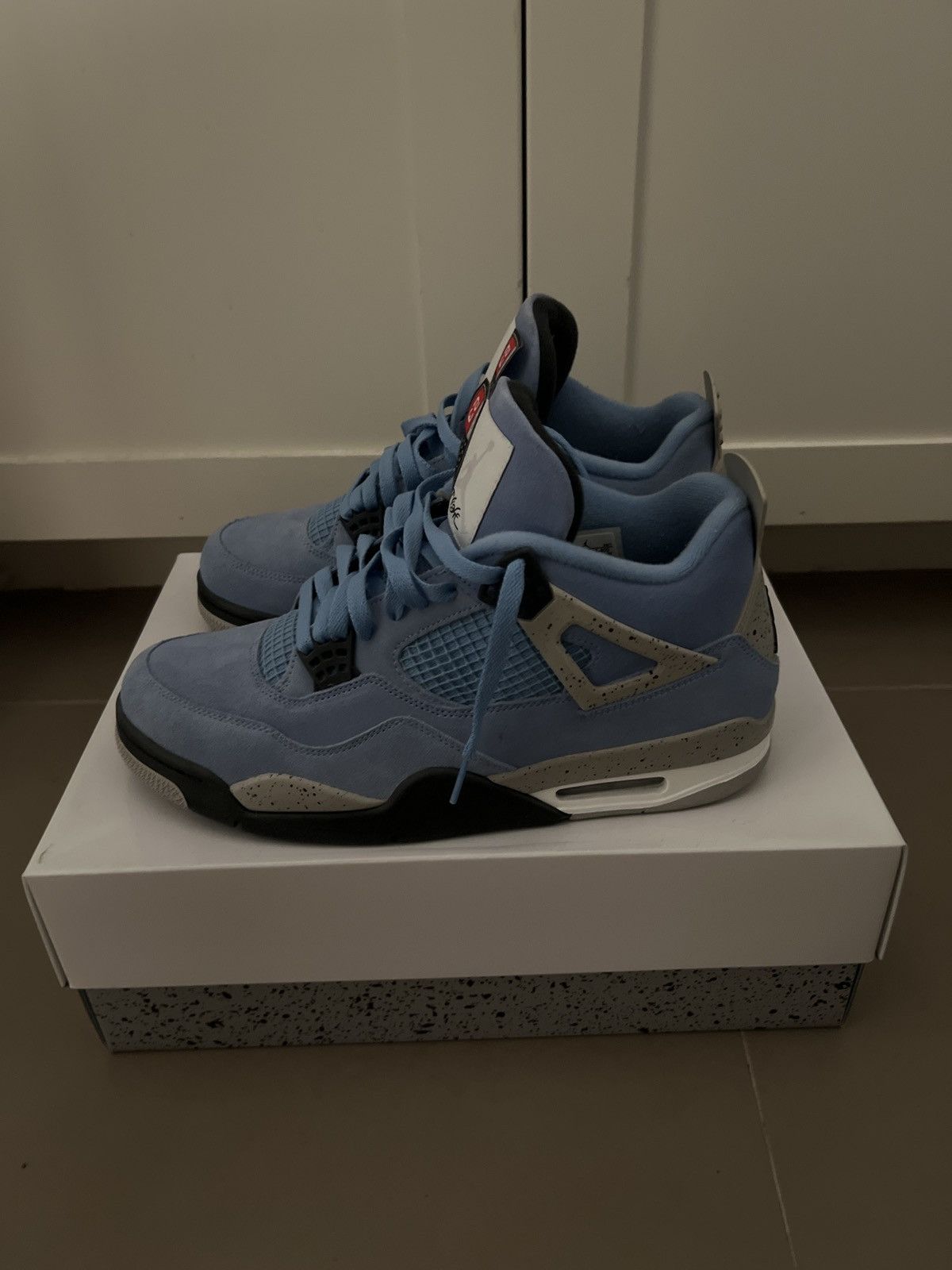 Jordan 4 “University Blue”