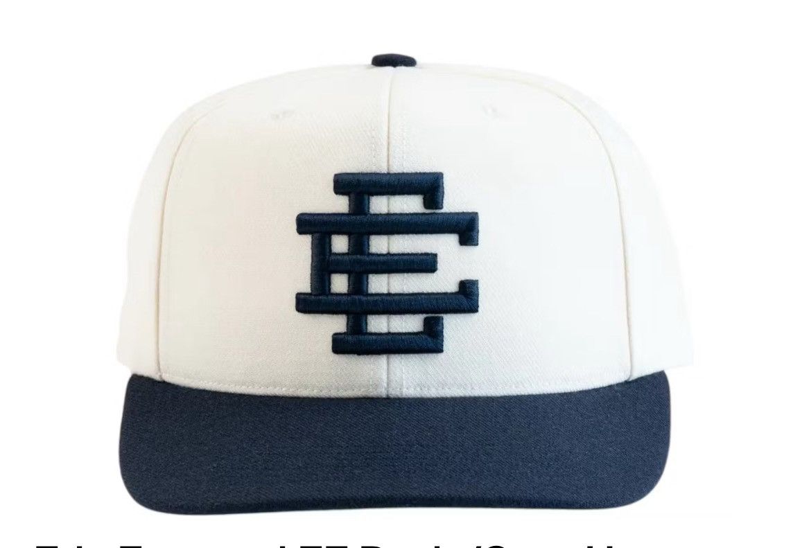 Eric Emanuel white w navy EE snapback hat