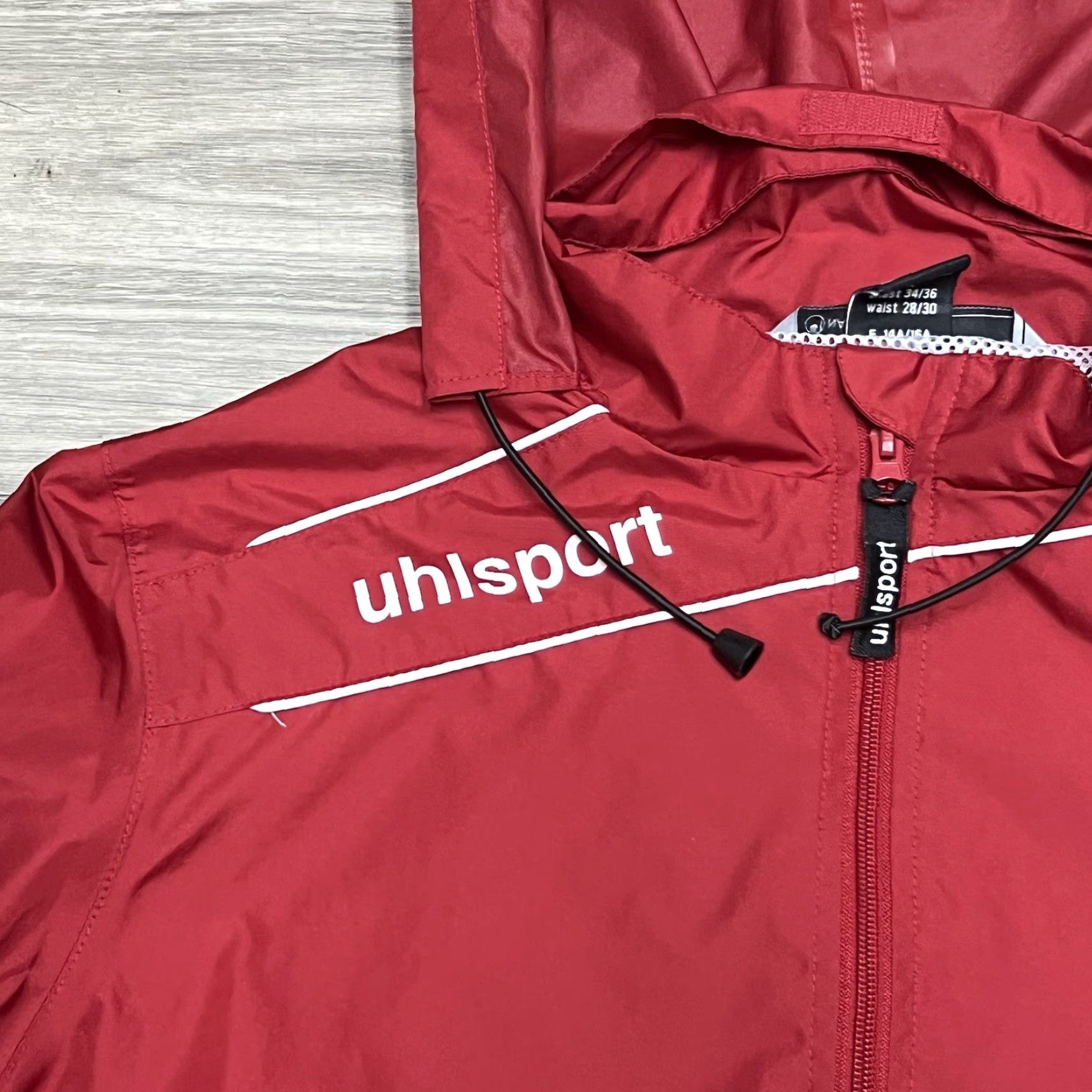 Vintage Uhlsport Rain Jacket Adult S Red Full Zip Windbreaker Jacket Men Regular Hooded Rain Coat Outdoor Fall Winter Weather Size US S / EU 44-46 / 1 - 5 Thumbnail