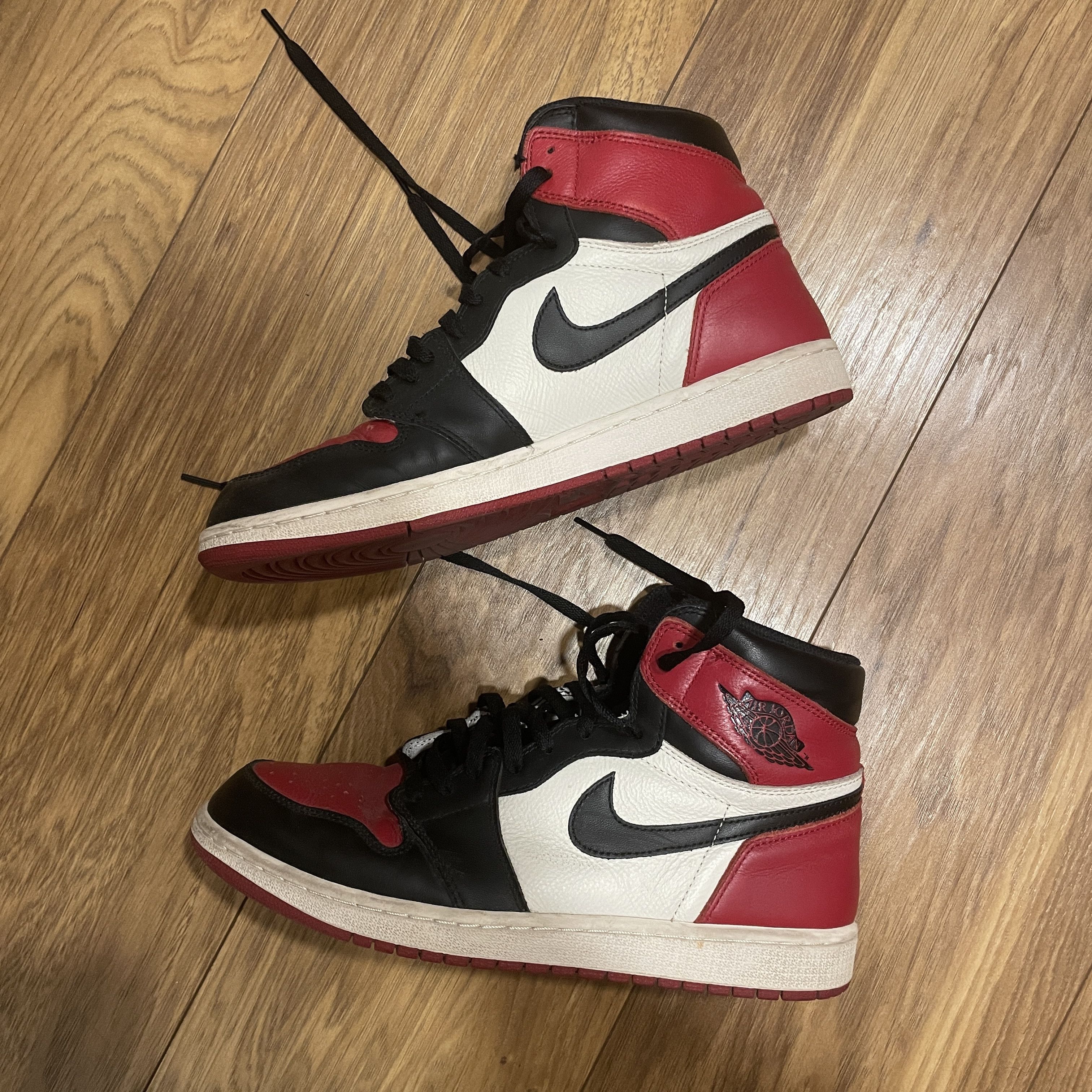 image of Nike Air Jordan 1 Retro High Bred Toe (2017) Shoes in Black Red, Men's (Size 11)