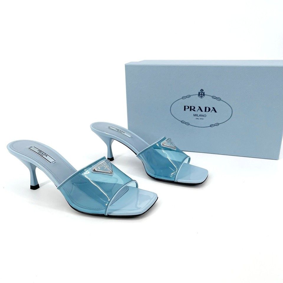 Prada Celeste Blue Leather Trimmed PVC Plexi Logo Plaque Mule Sandal