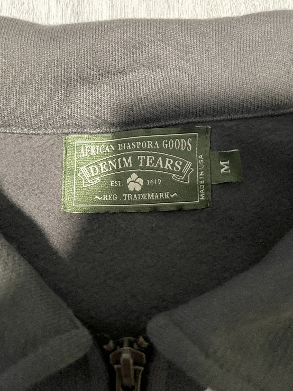 DENIM TEARS Denim Tears Rhinestone Cotton Wreath Quarter Zip DENIM TEARS Denim Tears Rhinestone Cotton Wreath Quarter Zip