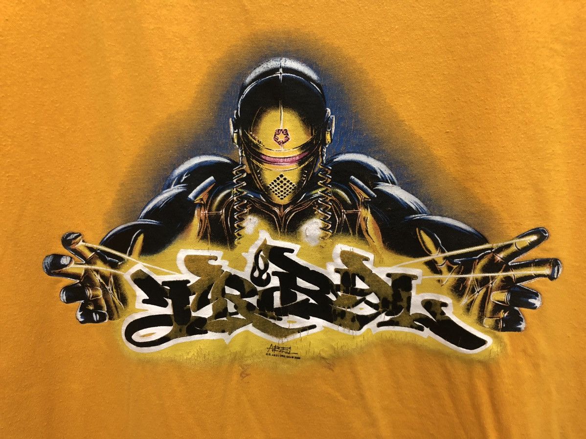 Tribal Streetwear × Vintage Y2K 🔥 TRIBAL USA ABEL CYBERPUNK MECHA ROBOT ART TEE RARE Size US L / EU 52-54 / 3 - 8 Thumbnail