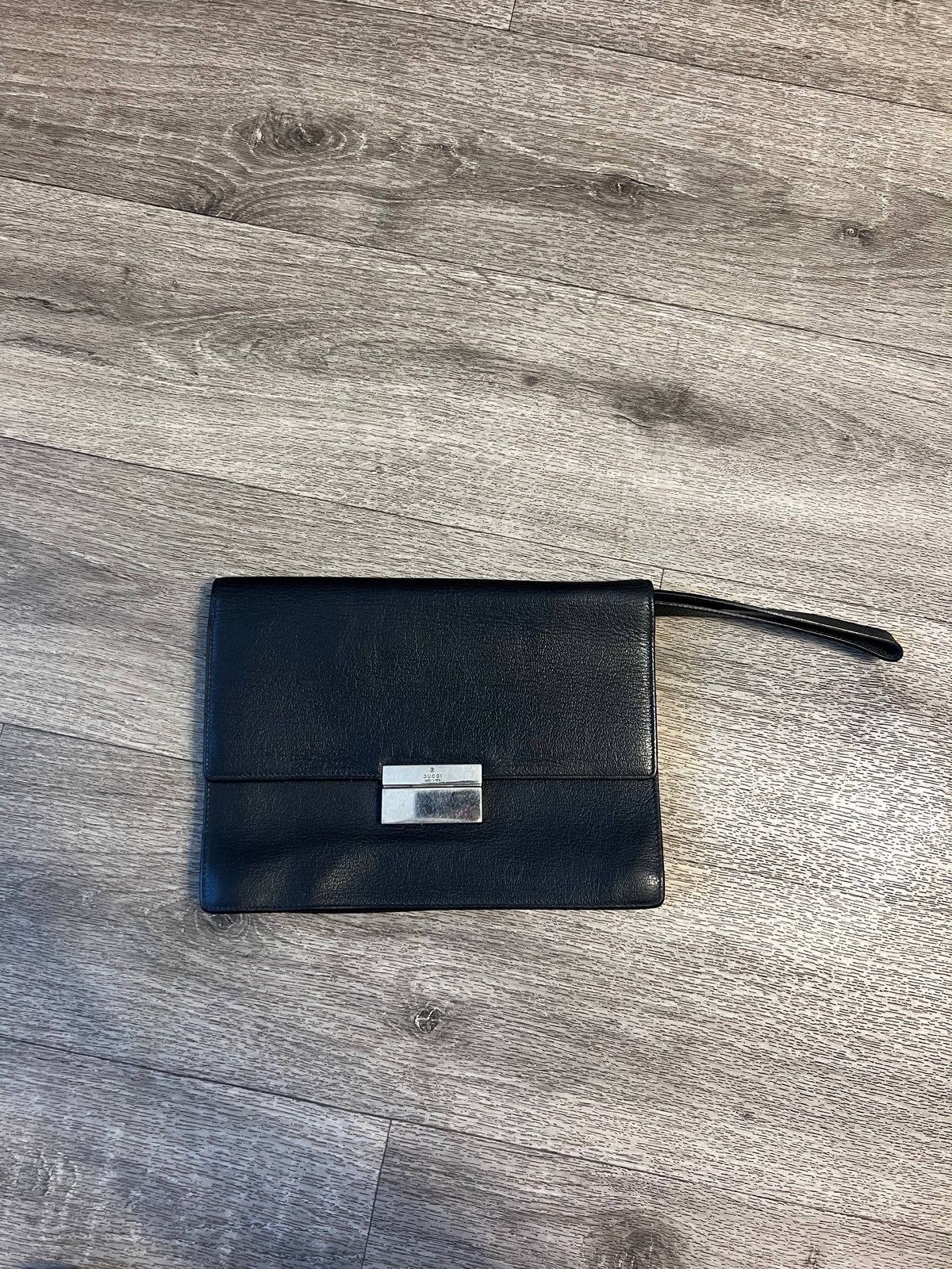 Leather flap clutch bag Gucci