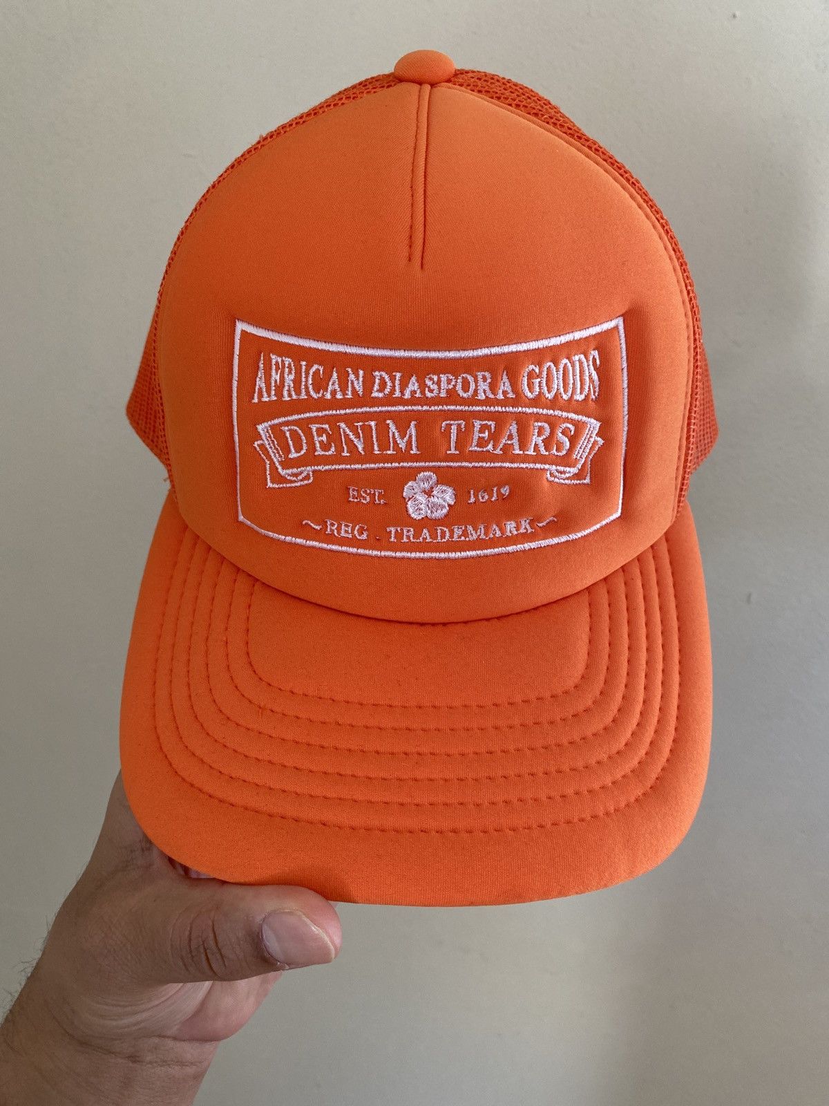 image of Denim Tears Trucker Cap Hat Mesh in Orange, Men's