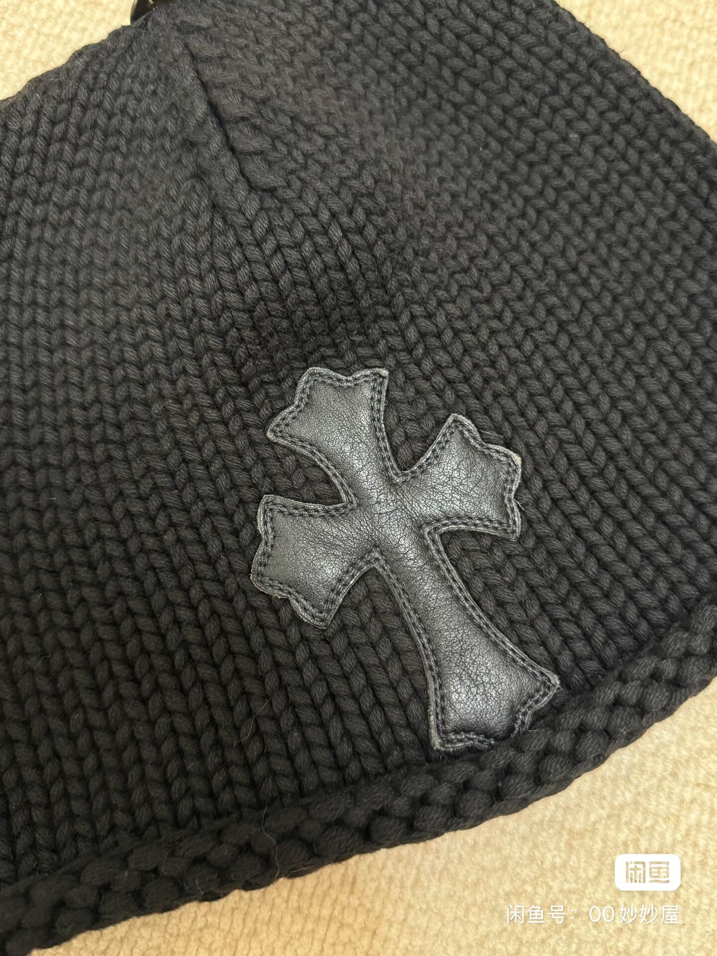 Black cross-patterned leather beanie
