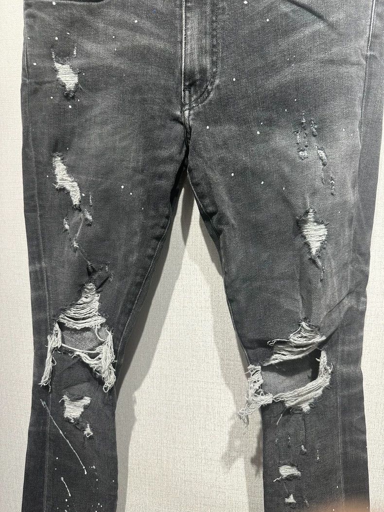 Amiri grey double knee hole spotted jeans