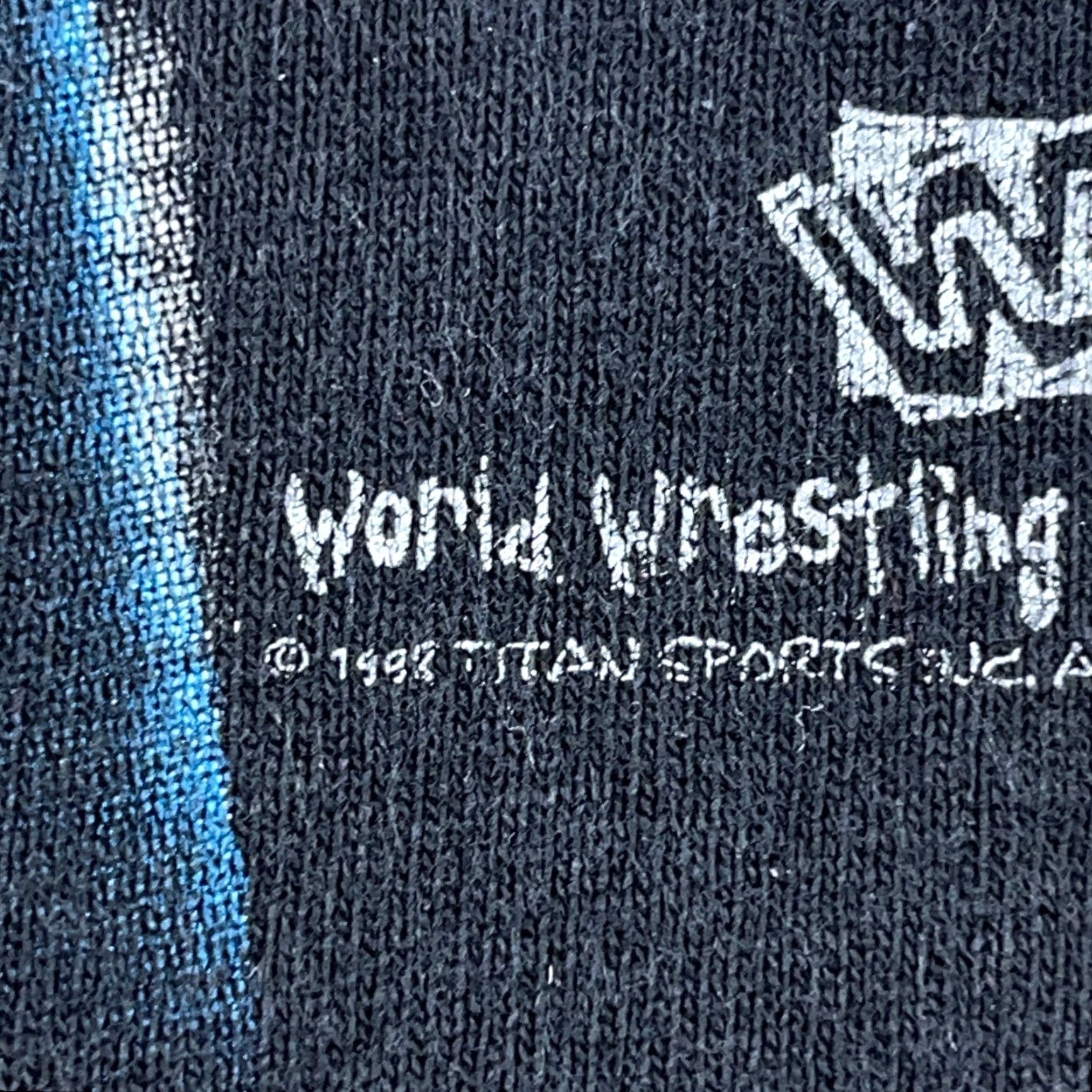 Logo 7 VINTAGE WWF Undertaker Shirt Men XL Black 90s Wrestling Tee Big Logo WWE 1999 90s Theme Mens XLT-Shirt? Size US XL / EU 56 / 4 - 5 Thumbnail
