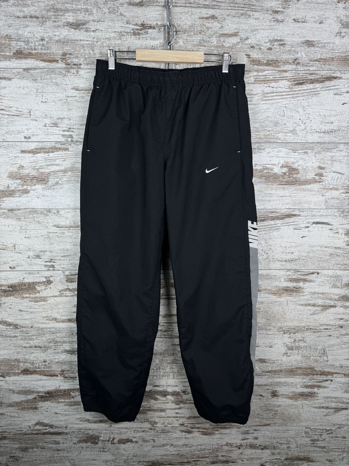 Nike × Vintage Mens Vintage Nike swoosh black sweatpants y2k pants joggers Size US 32 / EU 48 - 1 Thumbnail
