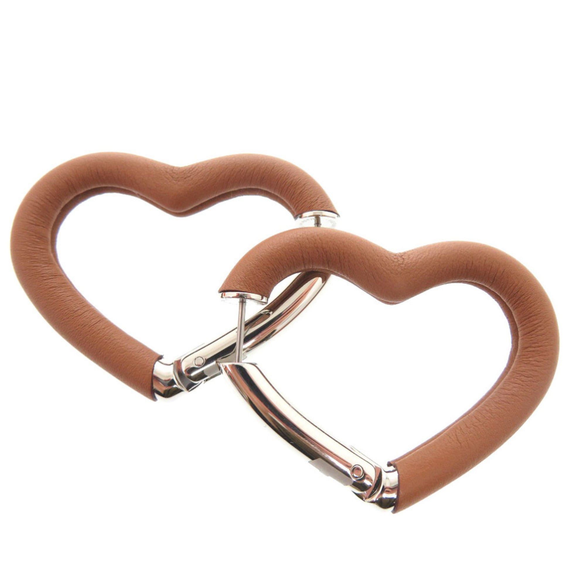 Hermes Hermes Like new Hermès Au Coeur du Faubourg COEUR DU FAUBOURG 500243FKAU earrings in Swift leather, palladium gold, 1401 Size ONE SIZE - 1 Thumbnail