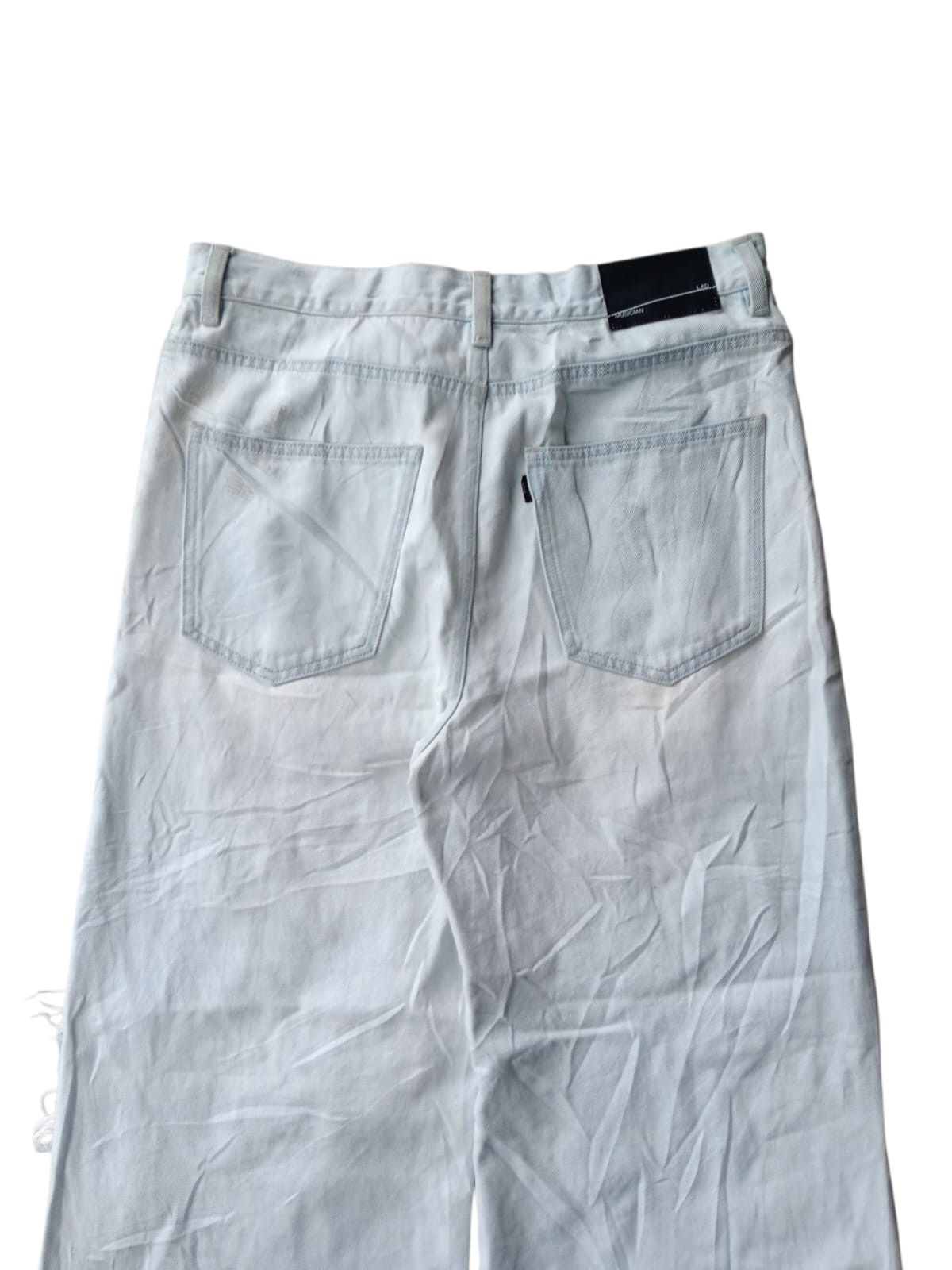 Lad Musician Splatter distressed light blue baggy jeans Size US 32 / EU 48 - 12 Thumbnail