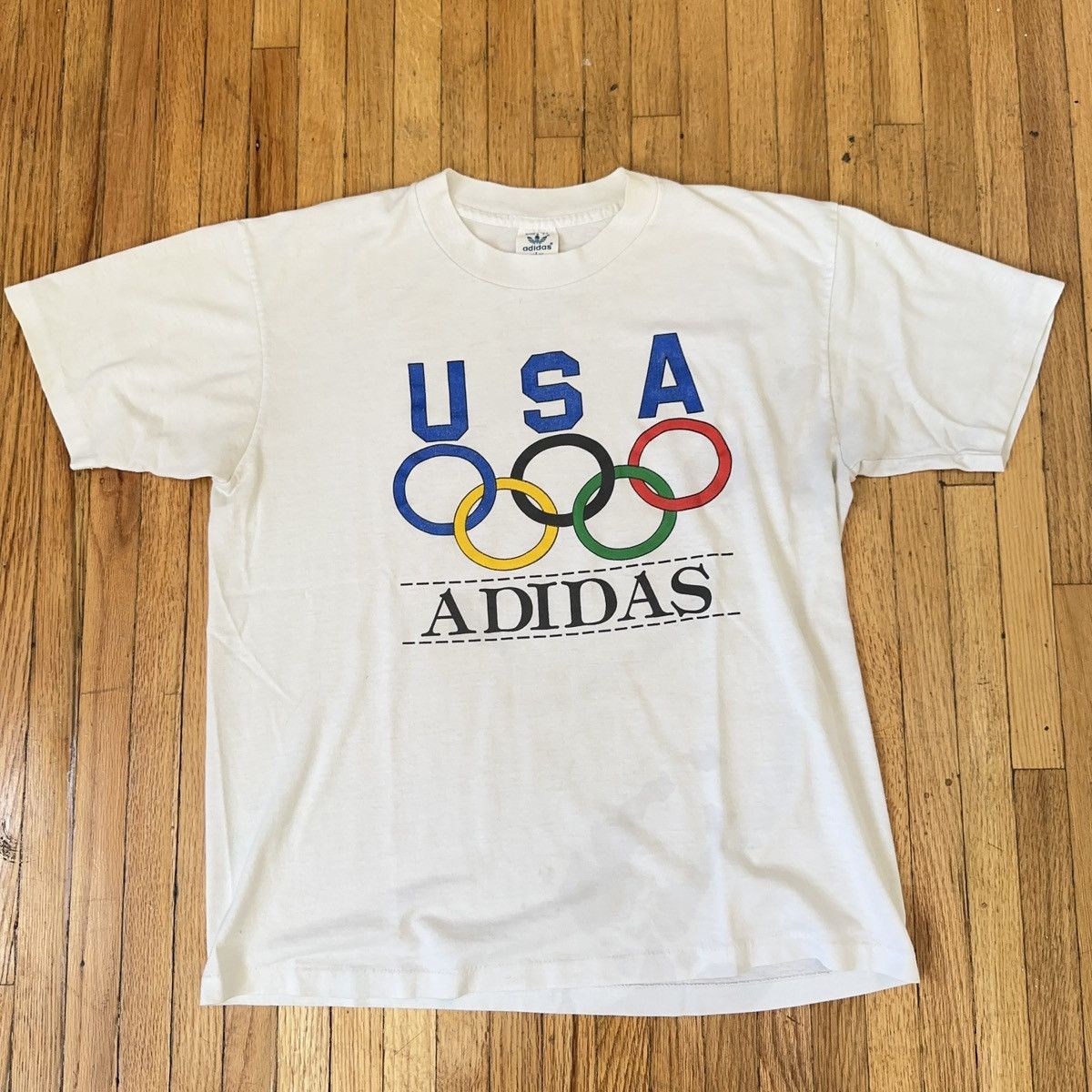 Image of Vintage 1988 Olympic Games Adidas Single Stitch Shirt in White, Men's (Size Small)