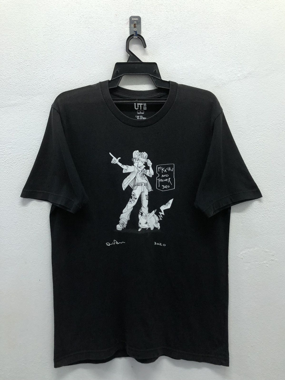 Uniqlo Uniqlo Nintendo Pokemon Pikachu And Trainer 3020 T-Shirt Size US L / EU 52-54 / 3 - 1 Thumbnail