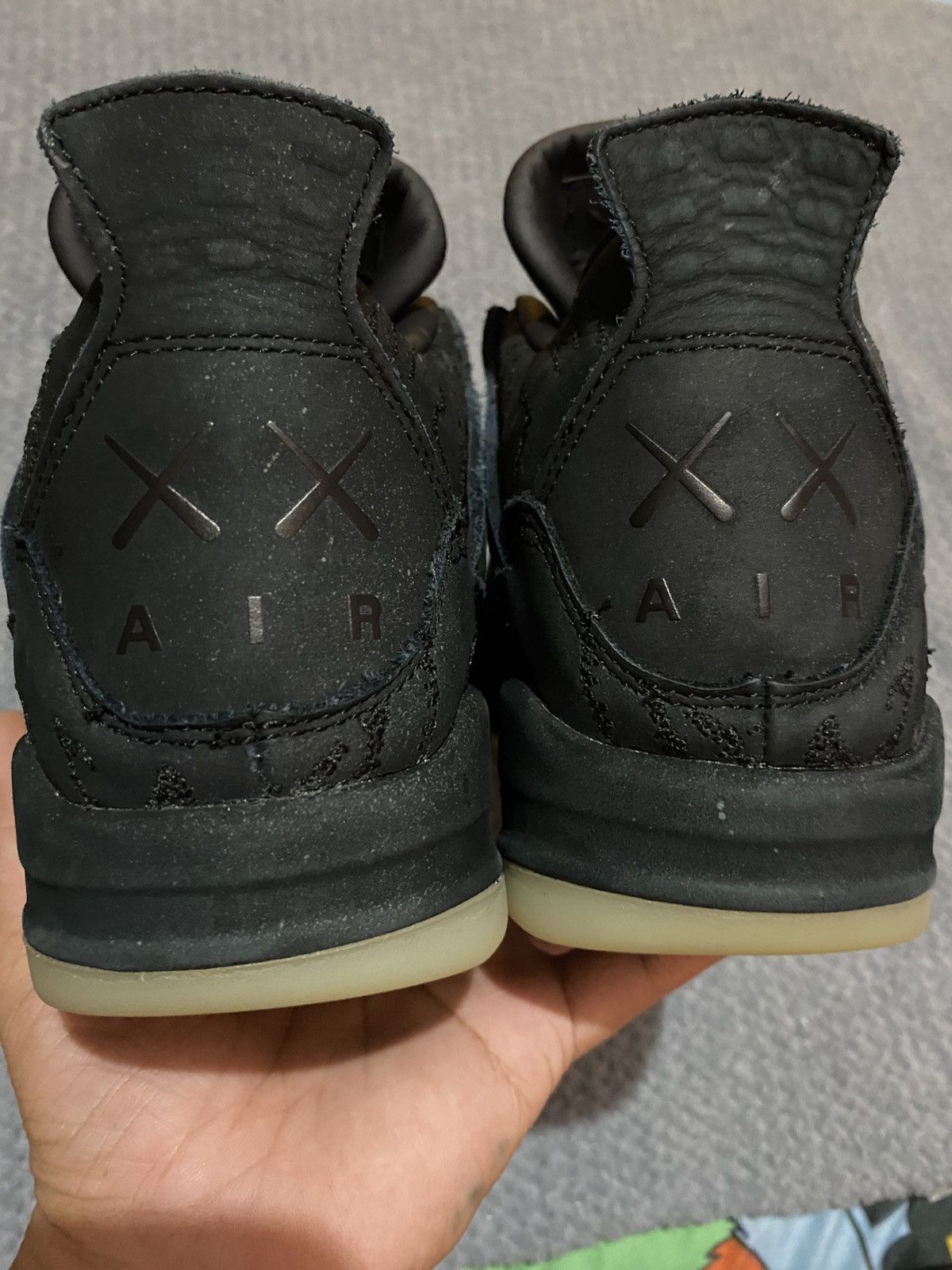 Jordan Brand × Kaws Nike Air Jordan 4 x Kaws "Black" Size US 7 / EU 40 - 4 Thumbnail