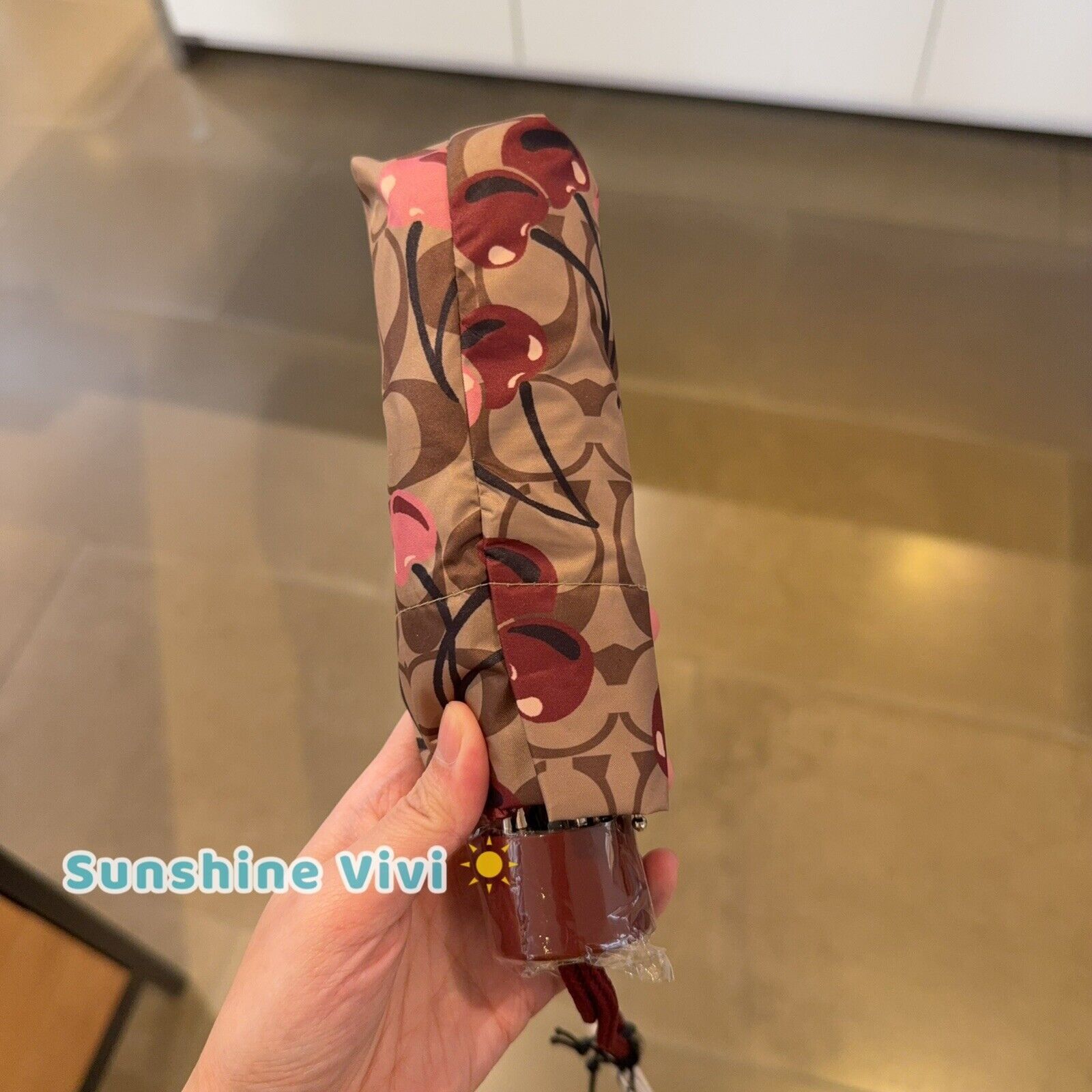 Coach NWT Coach UV Protection Mini Umbrella Cherry Khaki cz929 Size ONE SIZE - 3 Thumbnail