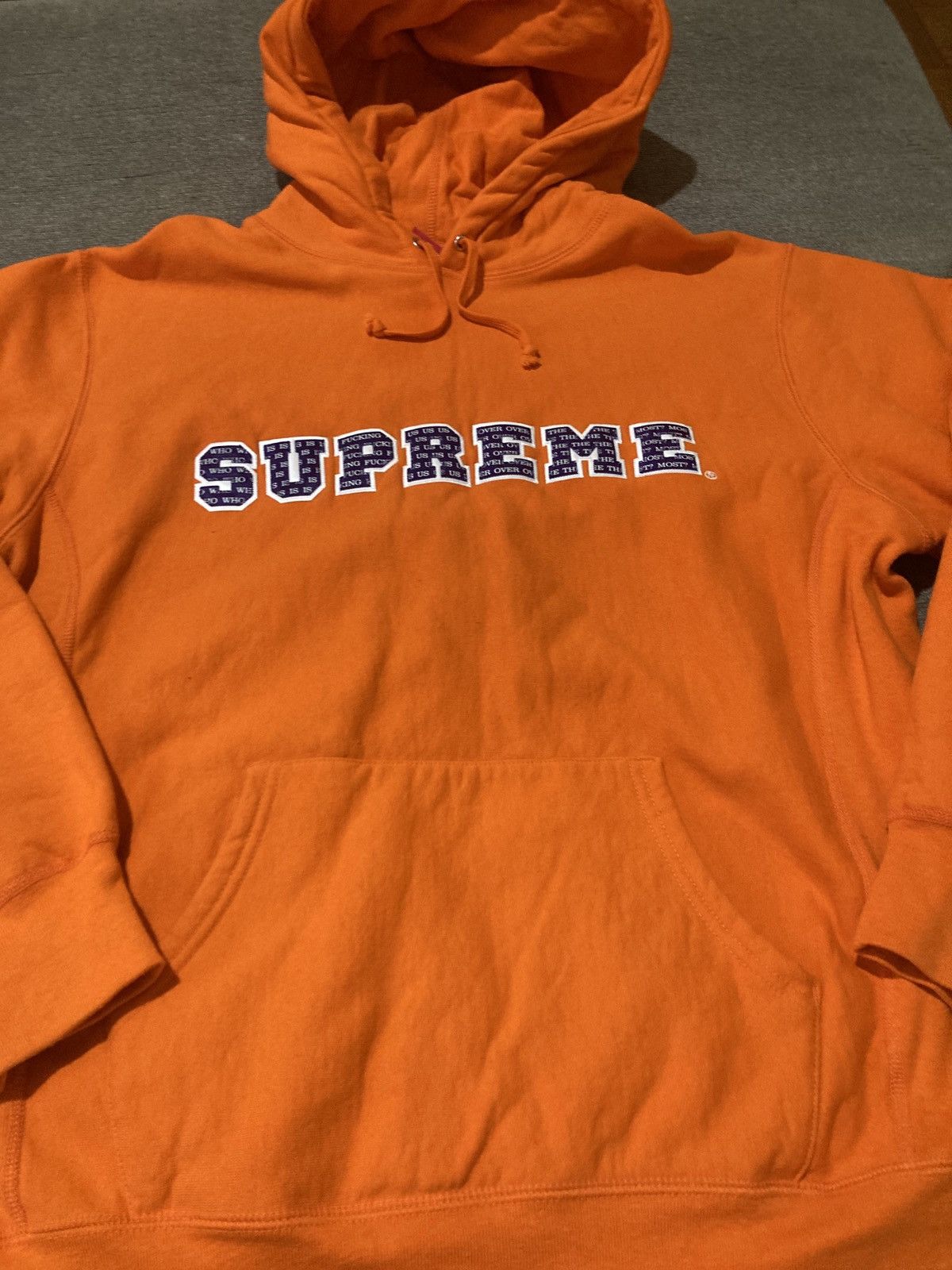 image of Supreme “Who Is Fucking Us Over The Most?” Hoodie in Orange, Men's (Size XL)