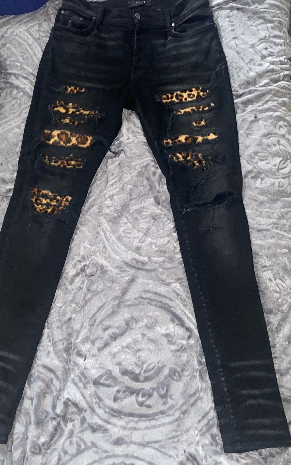 Black Amiri animal print jeans